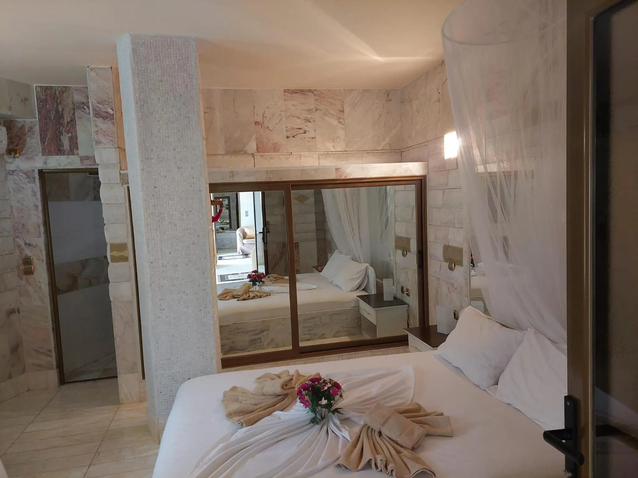 Bed in Paco's Resort Holiday Flats