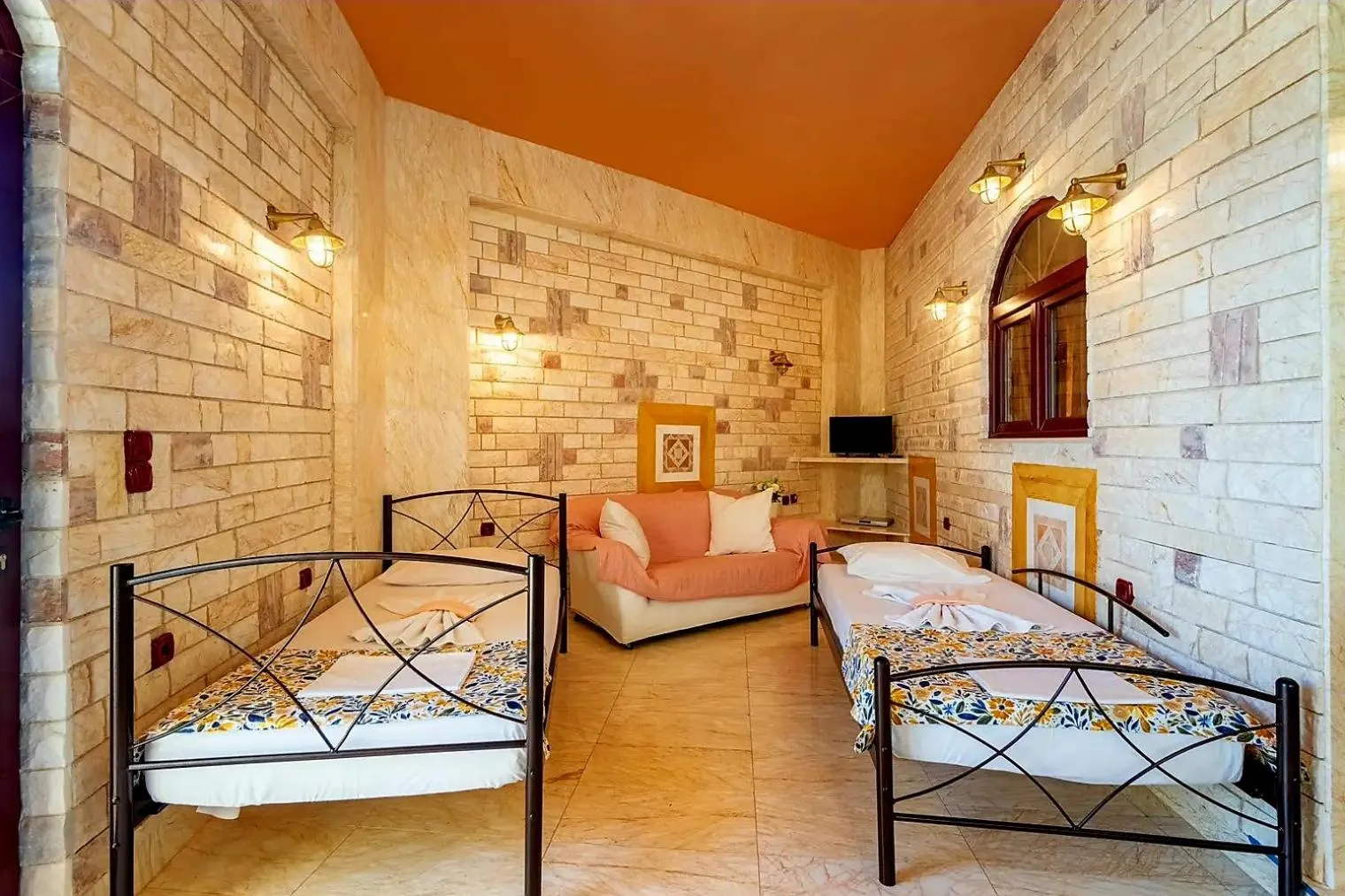 Bed in Paco's Resort Holiday Flats