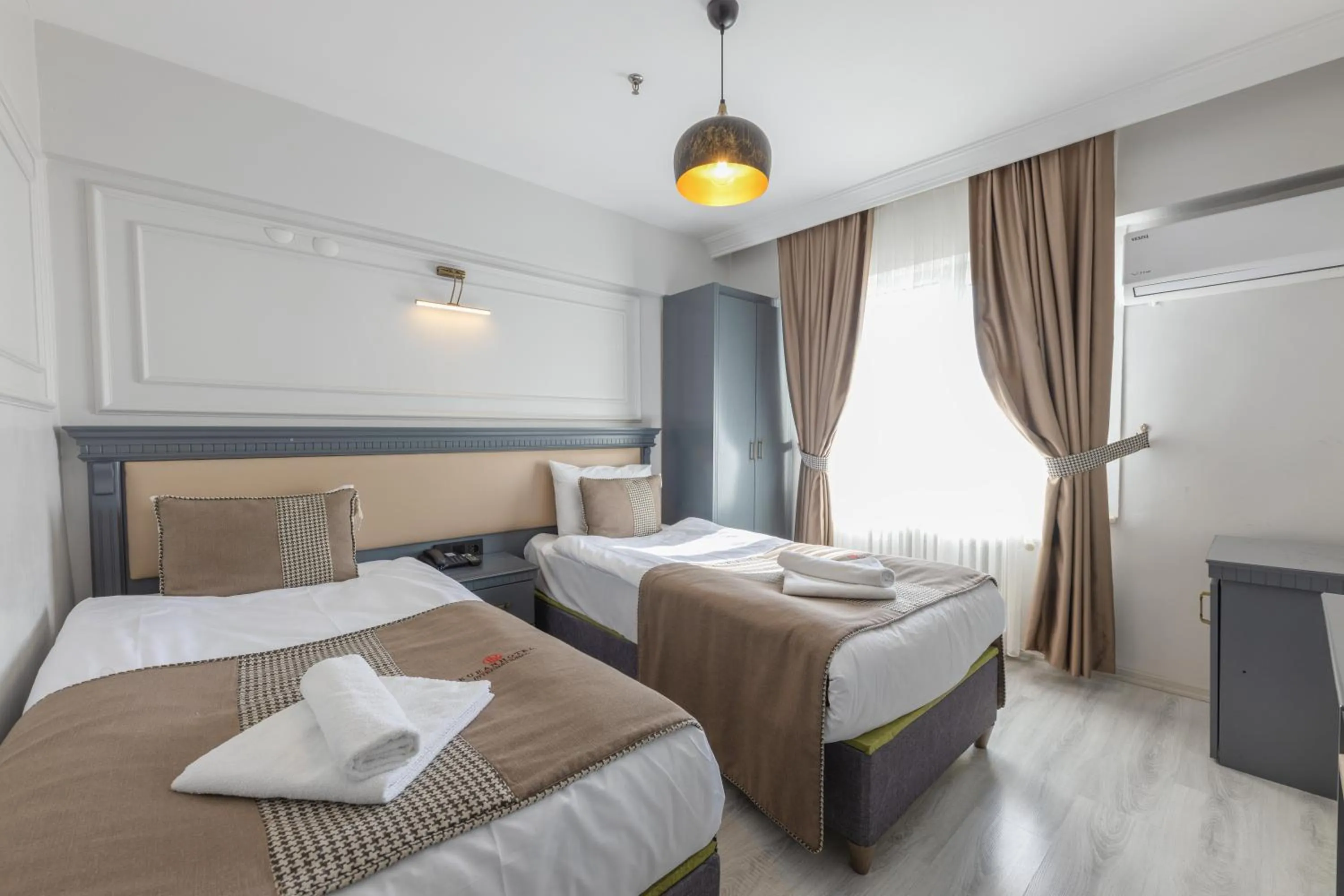 Bed in Kuran Hotel International