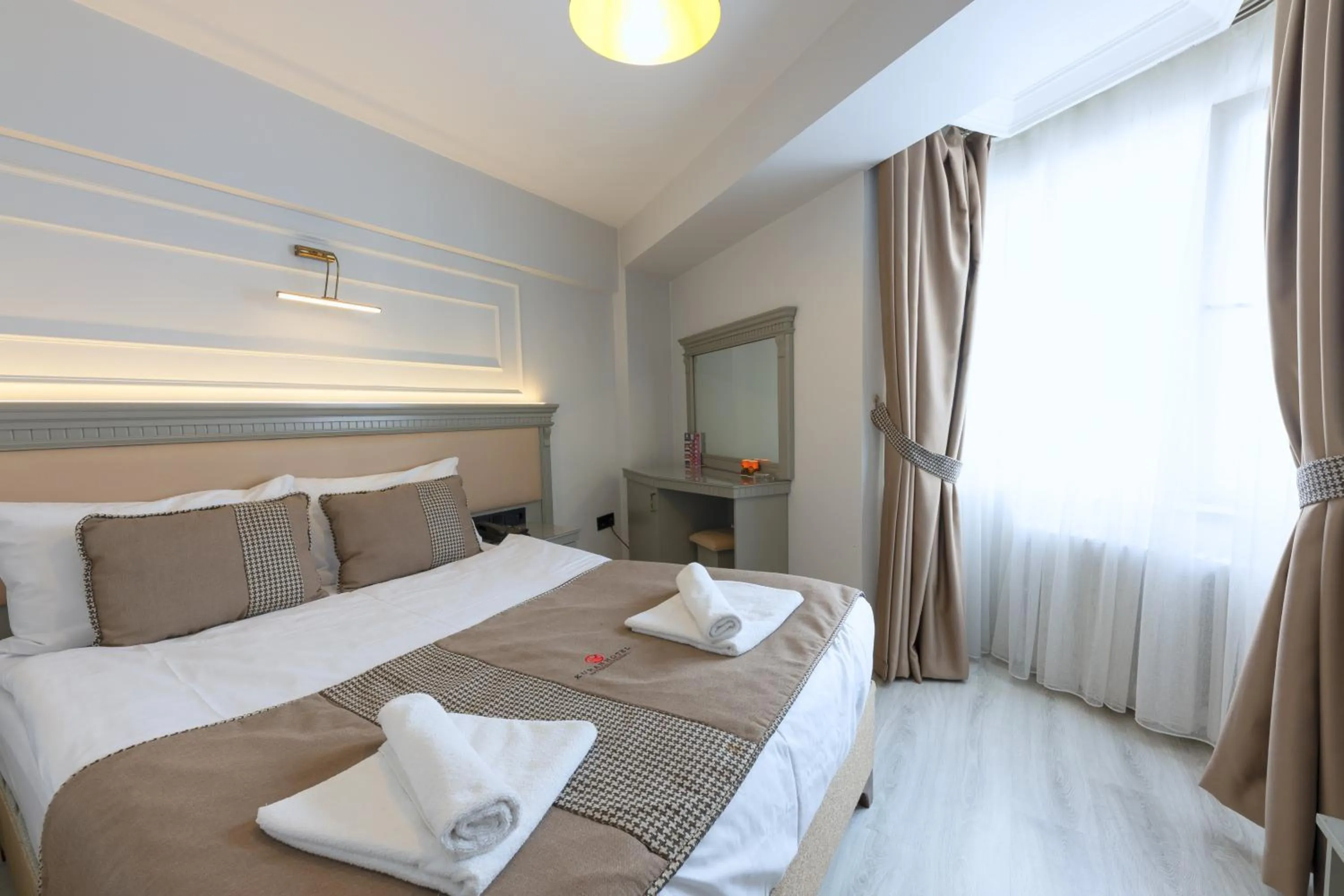 Bed in Kuran Hotel International