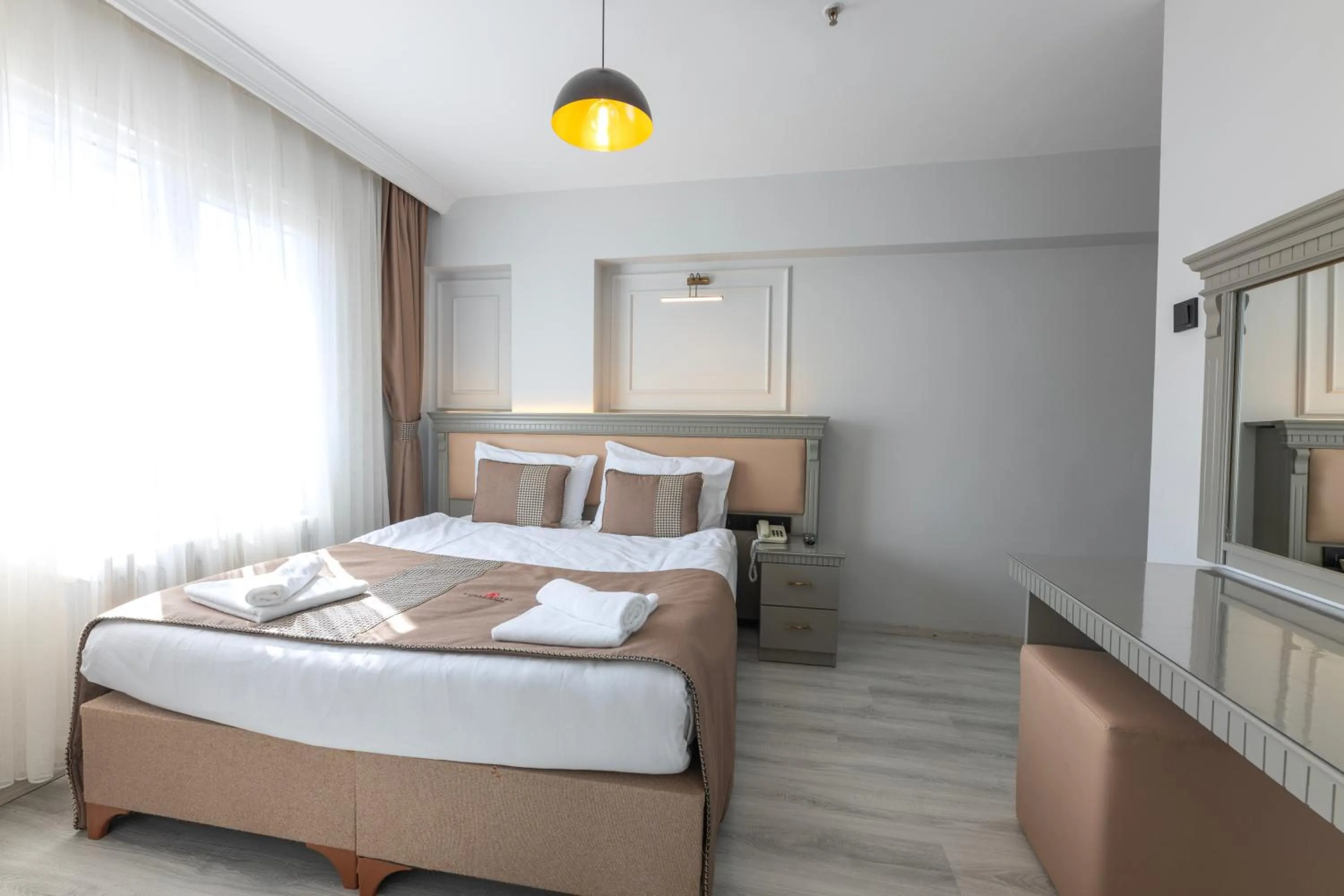 Bed in Kuran Hotel International