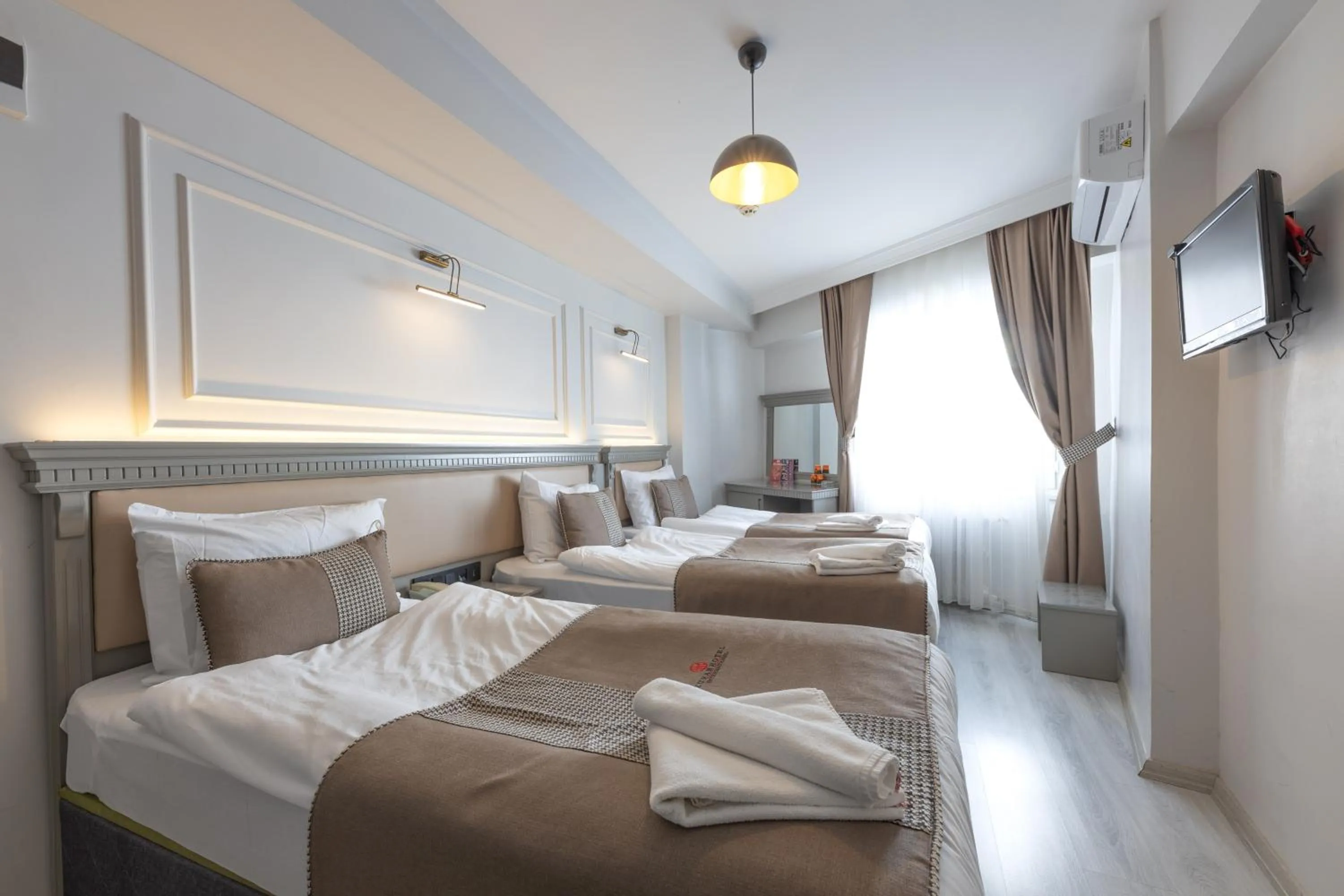 Bed in Kuran Hotel International