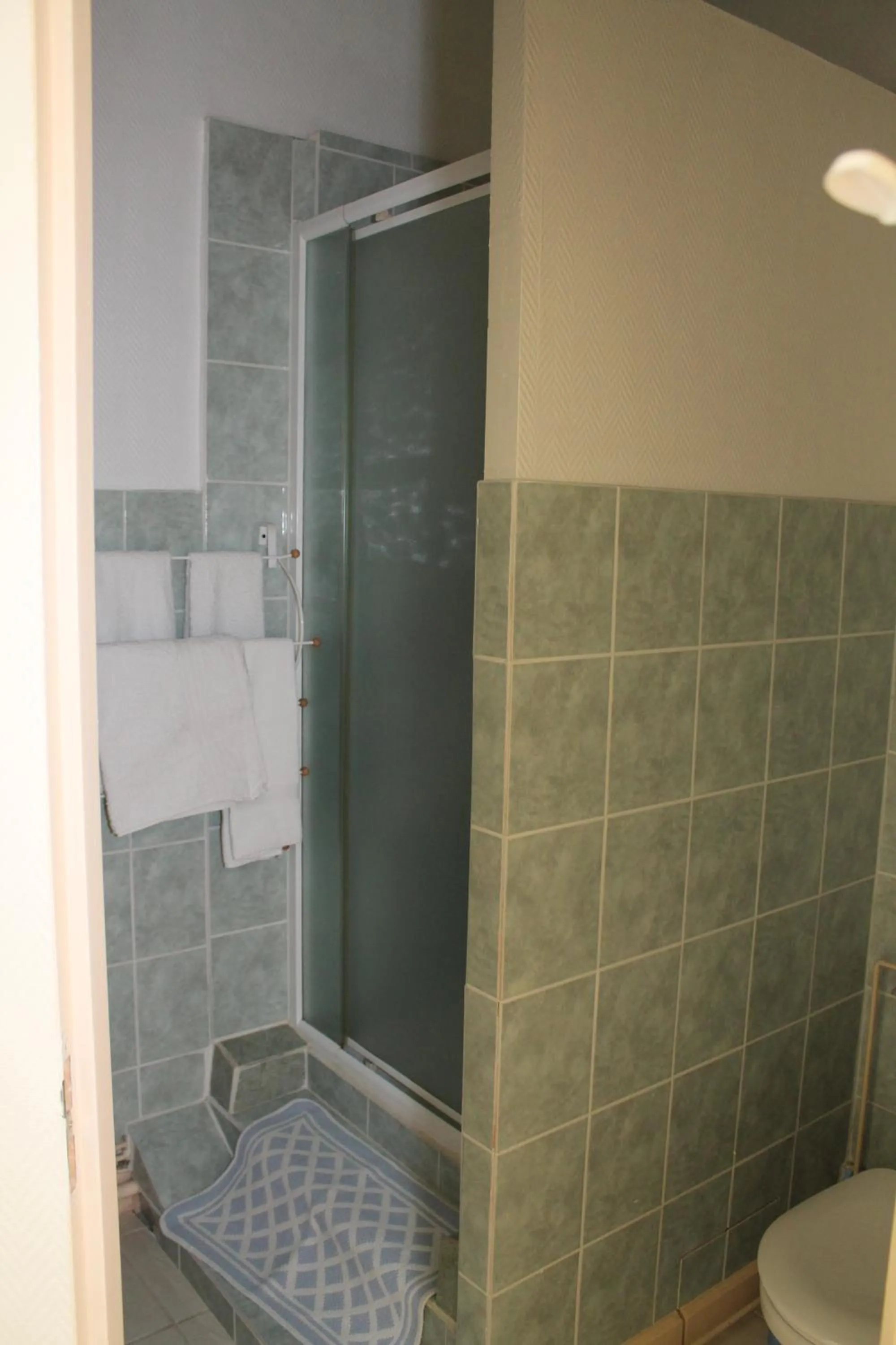 Bathroom in Logis Hôtel Beauséjour