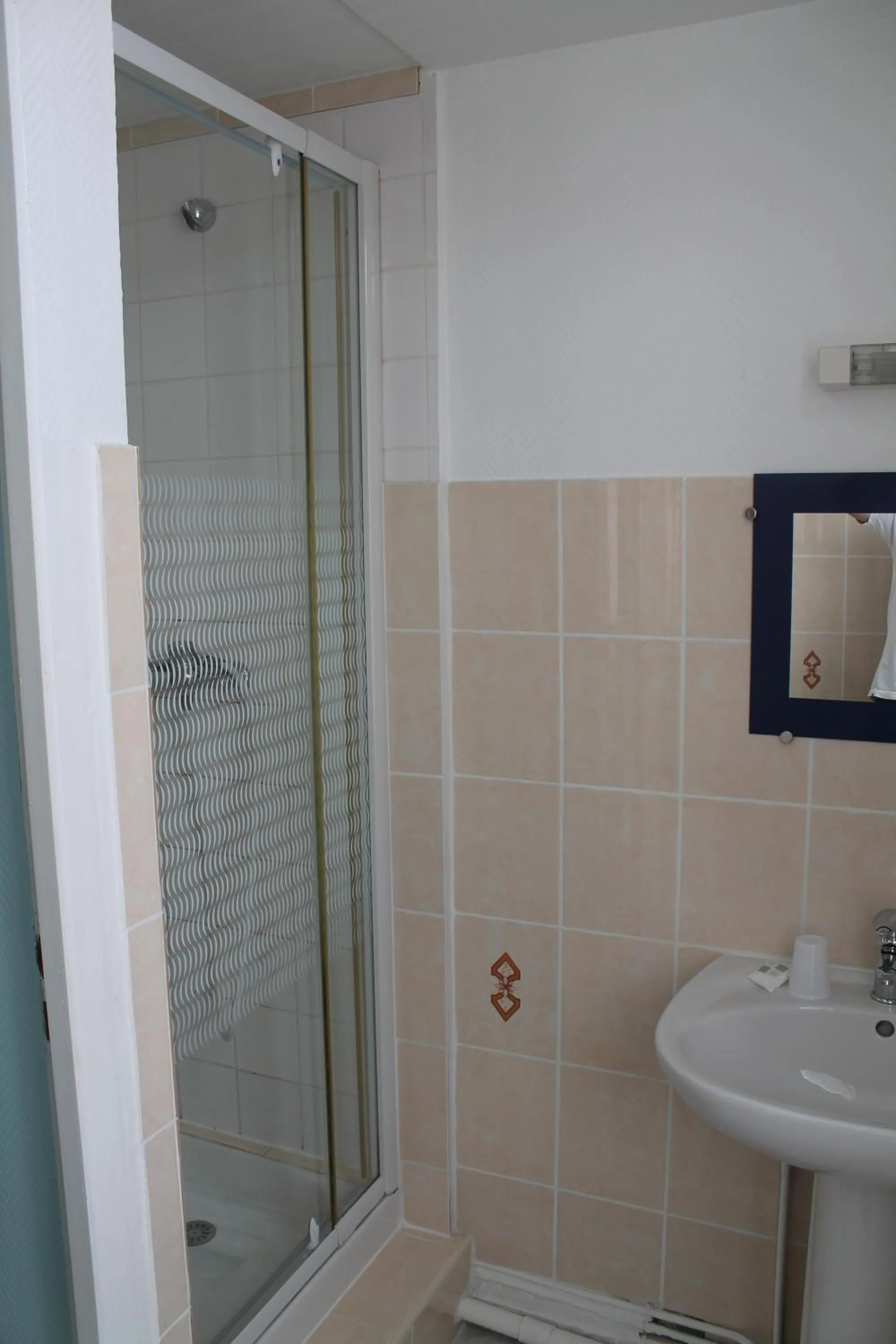 Bathroom in Logis Hôtel Beauséjour