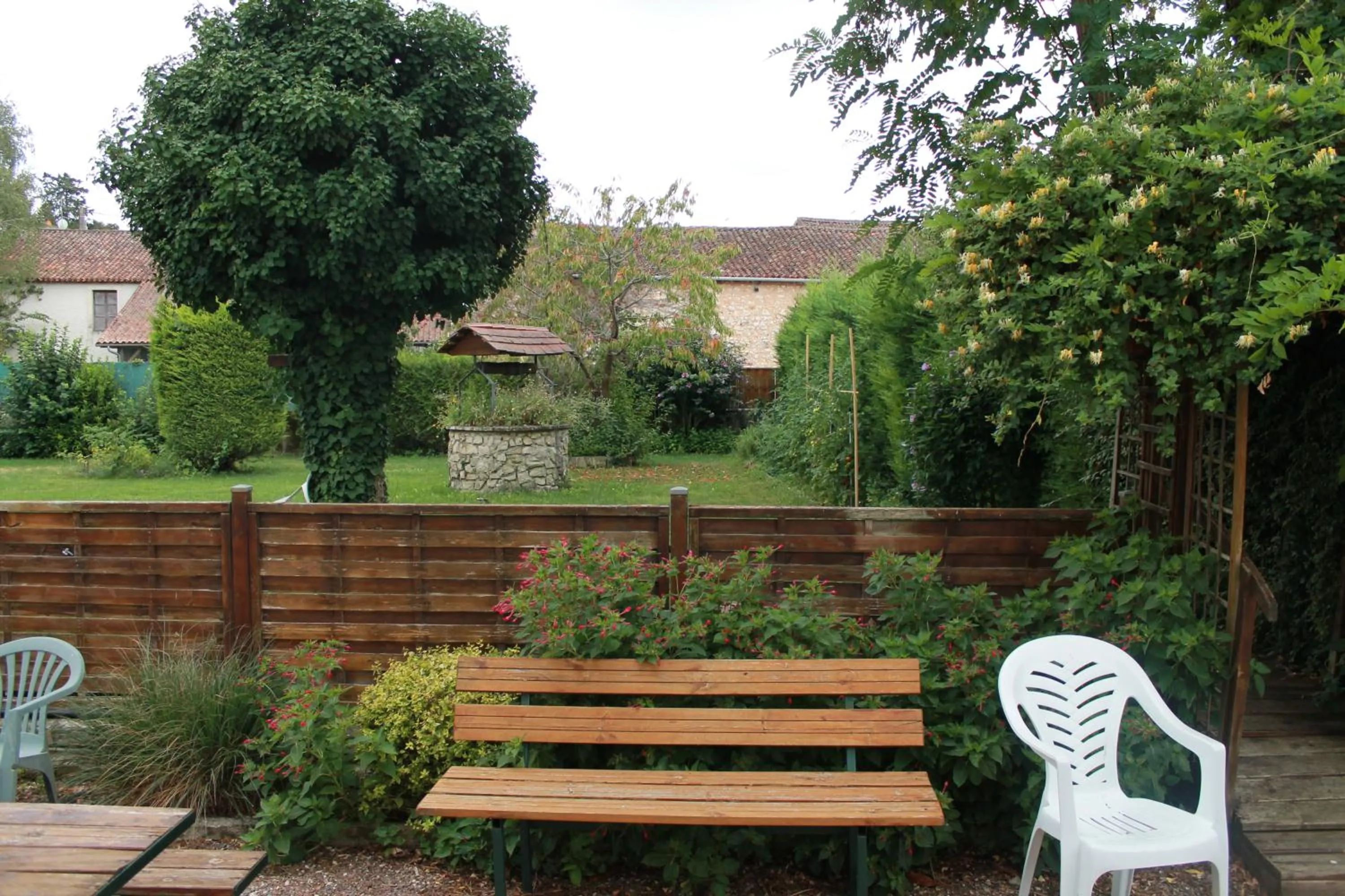 Garden in Logis Hôtel Beauséjour