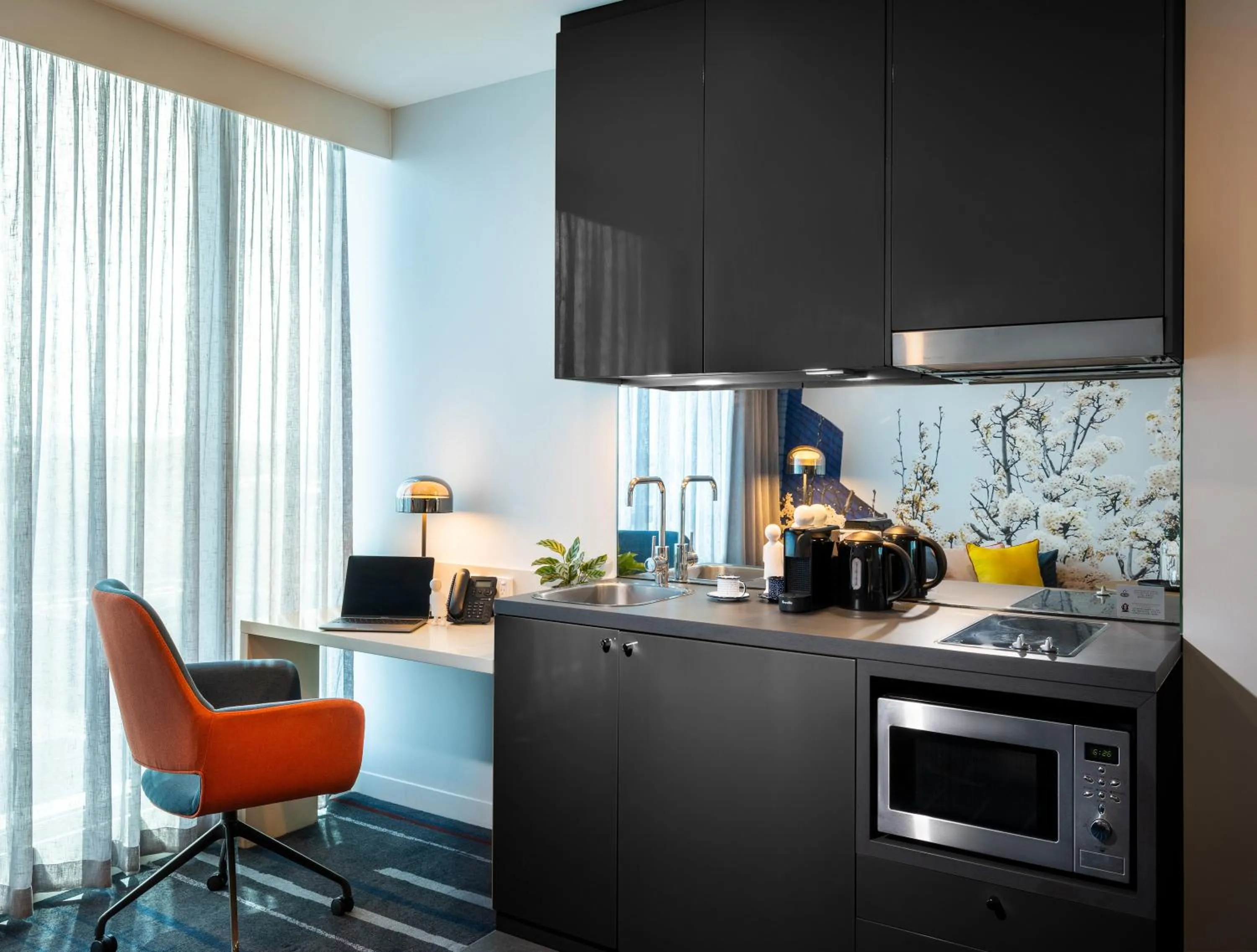 Kitchen or kitchenette in Novotel Melbourne Preston