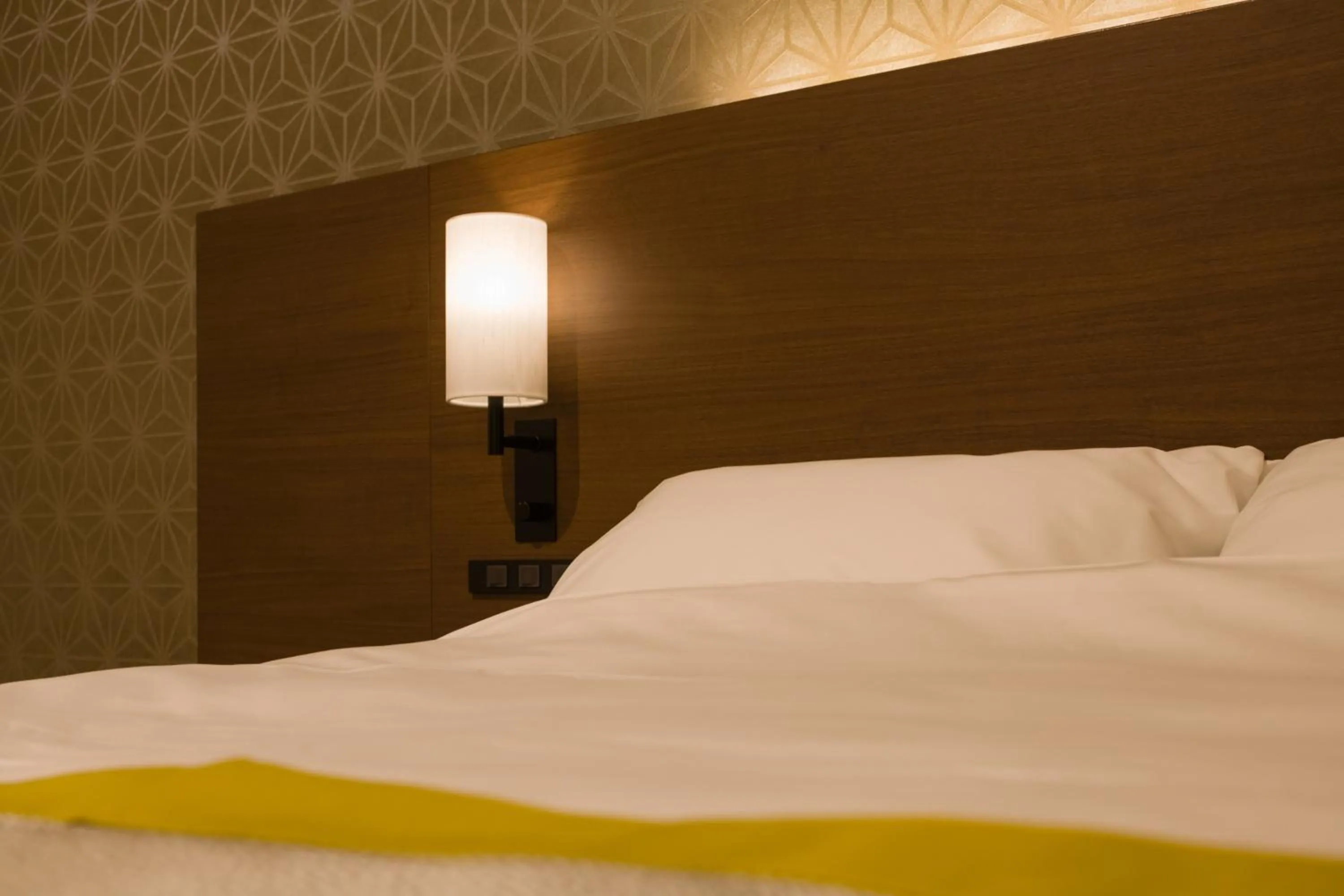 Bed in Tosei Hotel Cocone Ueno