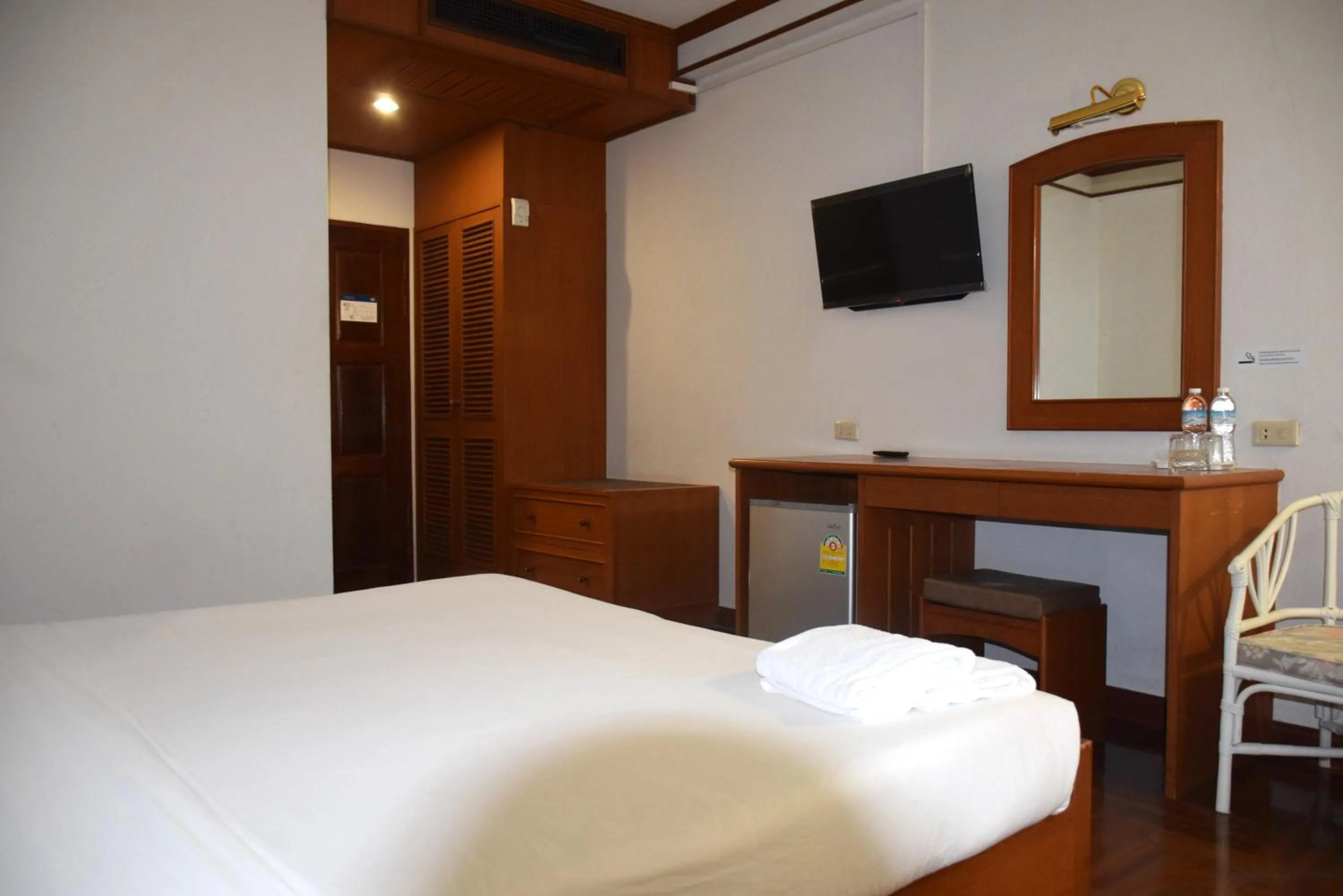 Bed in Puangpen Villa Hotel