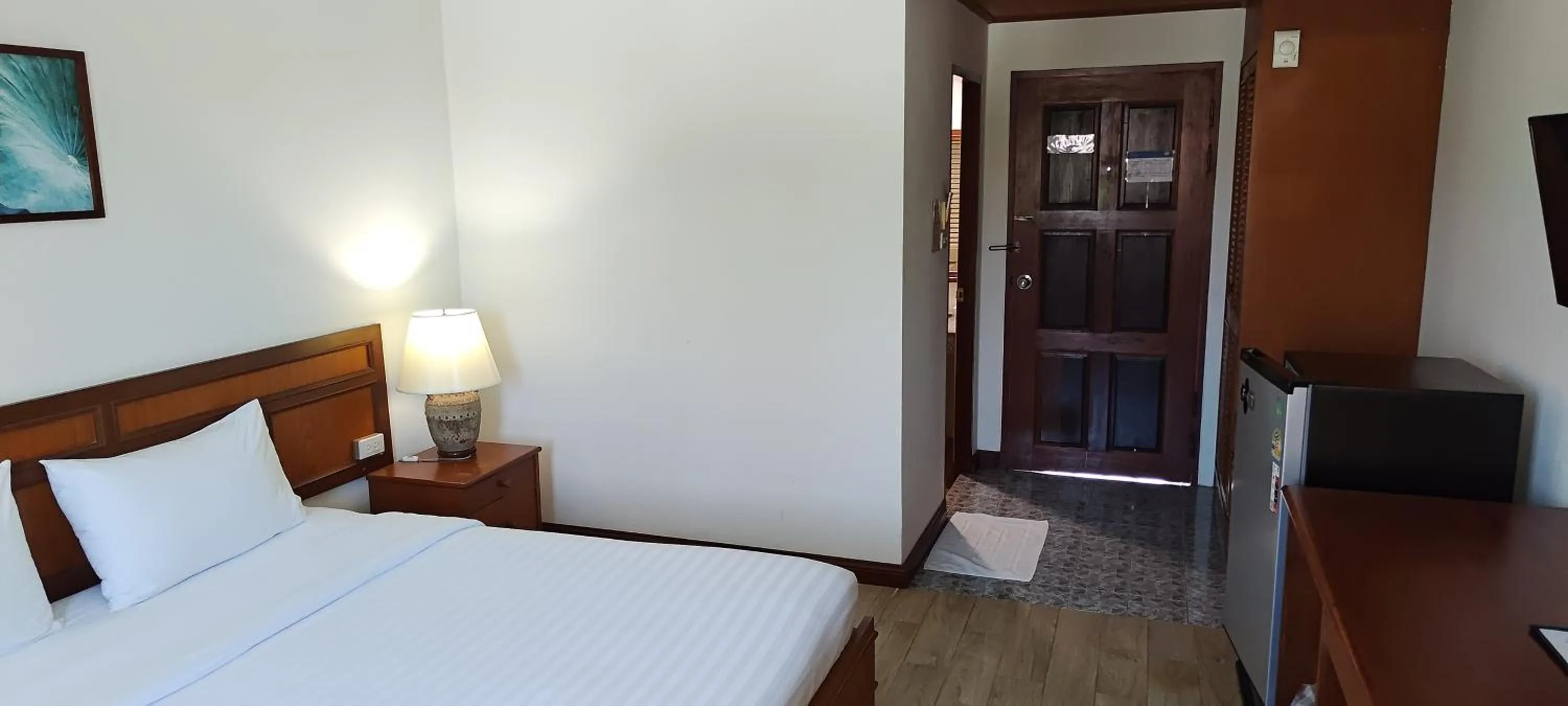 Bed in Puangpen Villa Hotel