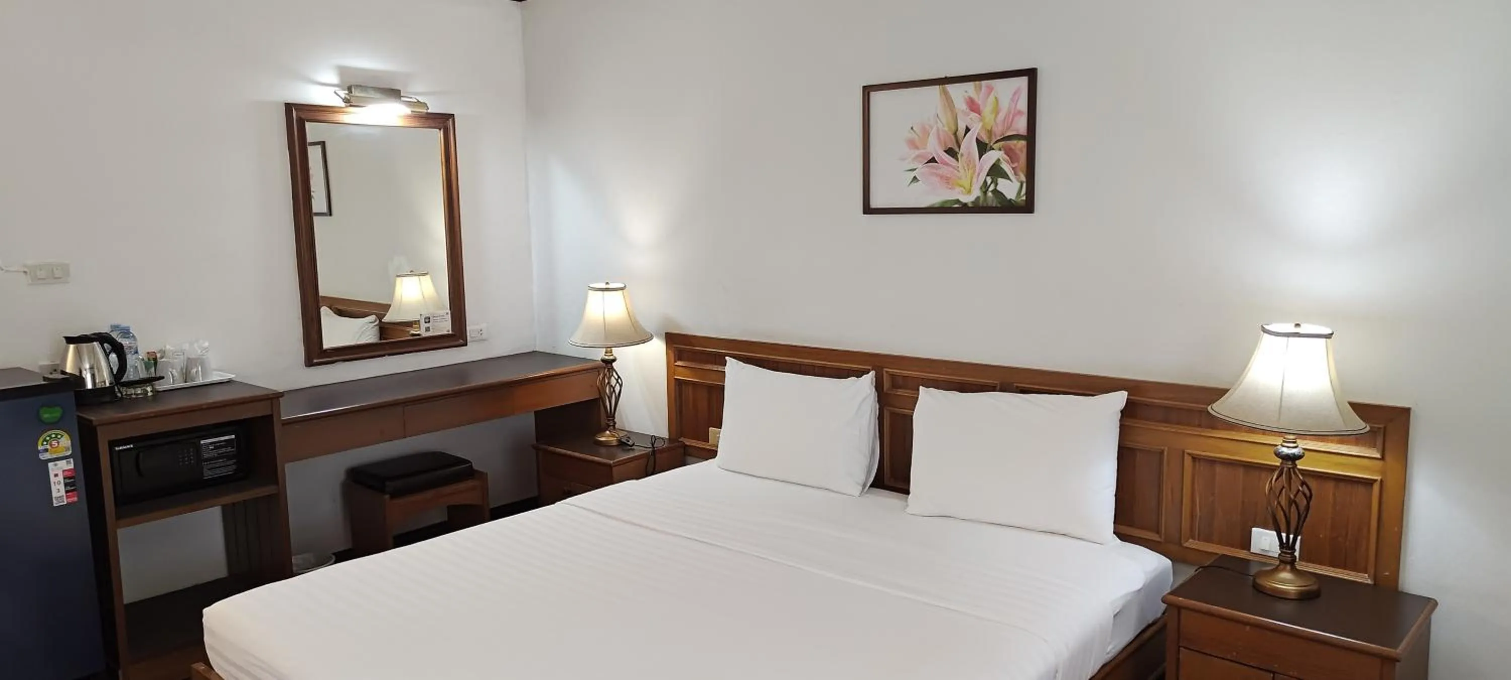 Bed in Puangpen Villa Hotel