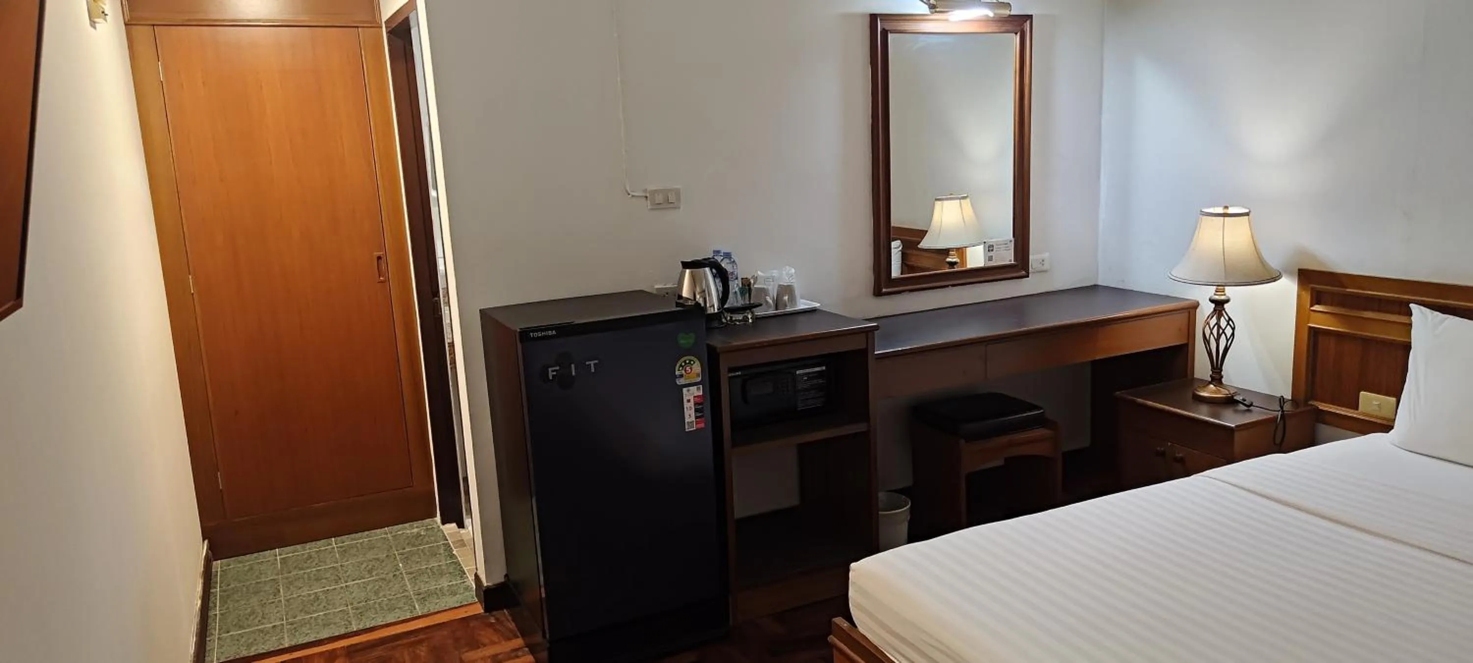 Bed in Puangpen Villa Hotel