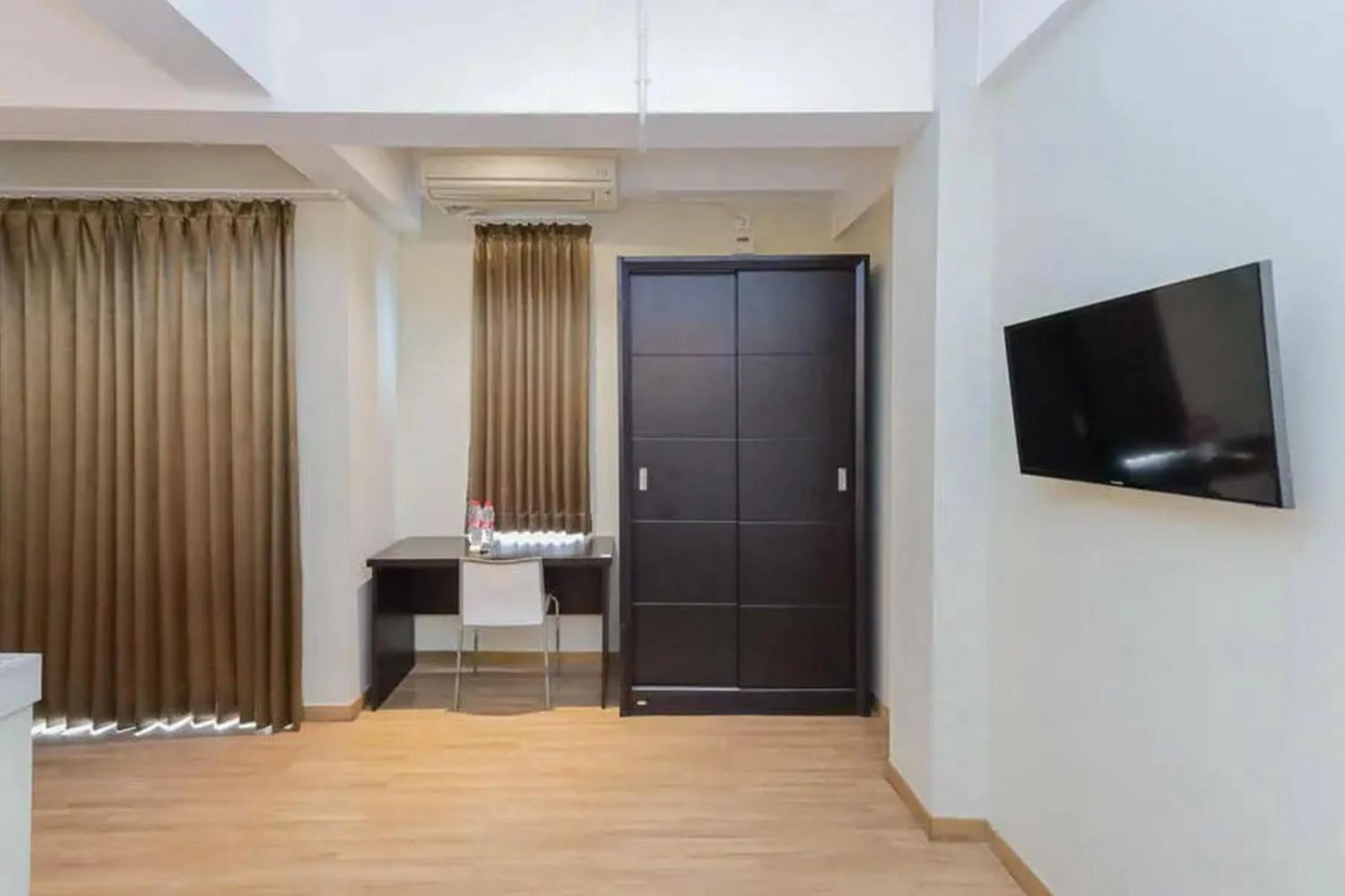 TV and multimedia in Capital O 91288 Chrysant Premiere Residence