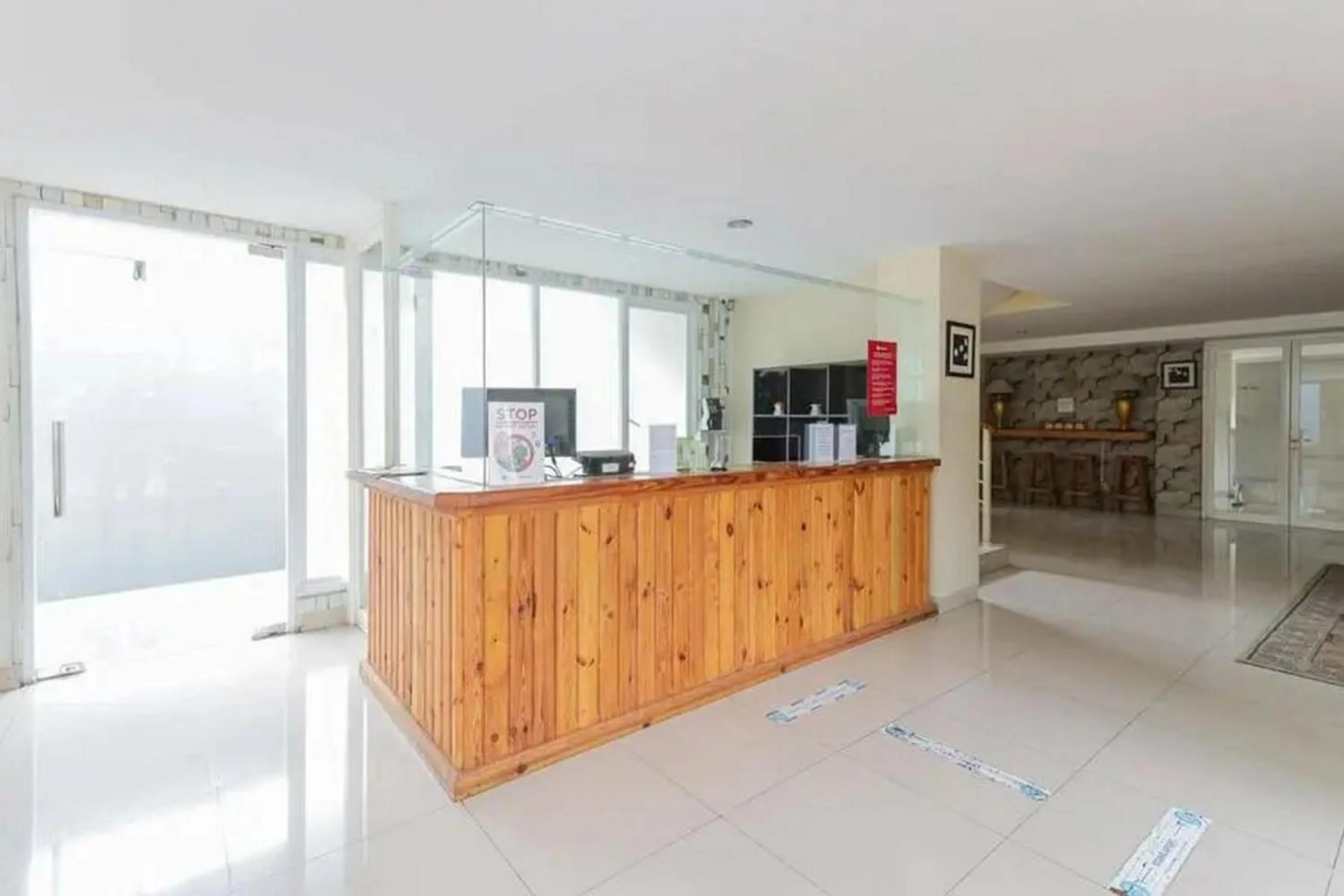 Lobby or reception in Capital O 91288 Chrysant Premiere Residence