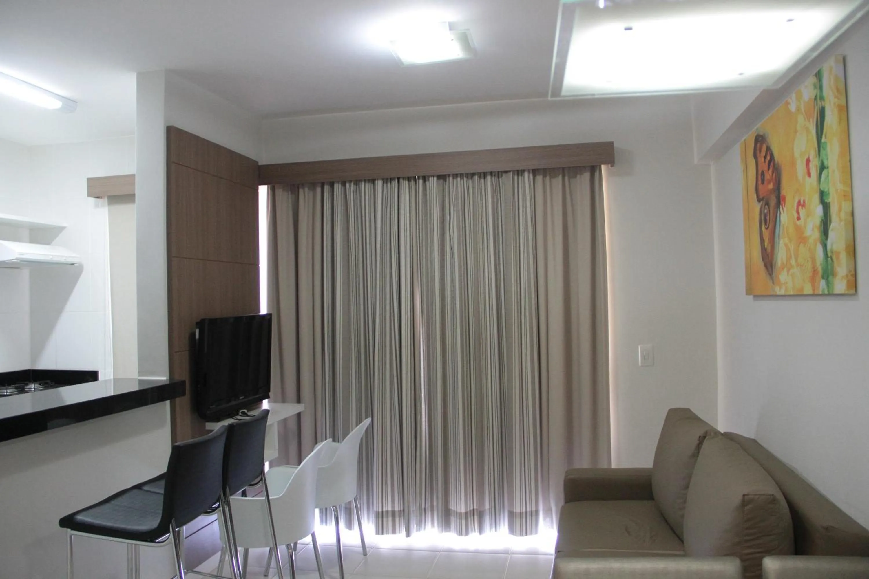 Communal lounge/ TV room in Veredas do Rio Quente Flat