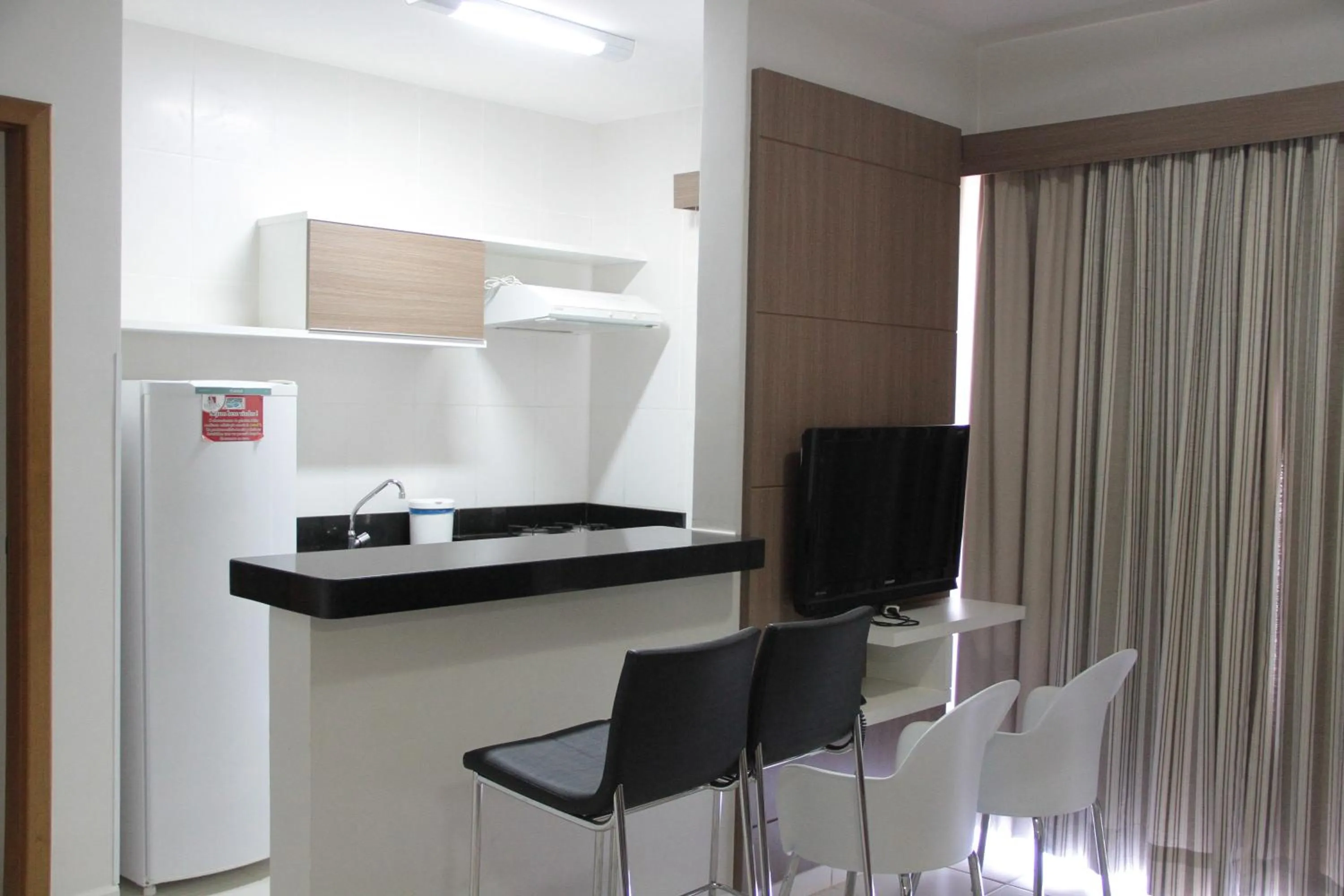 Communal kitchen in Veredas do Rio Quente Flat