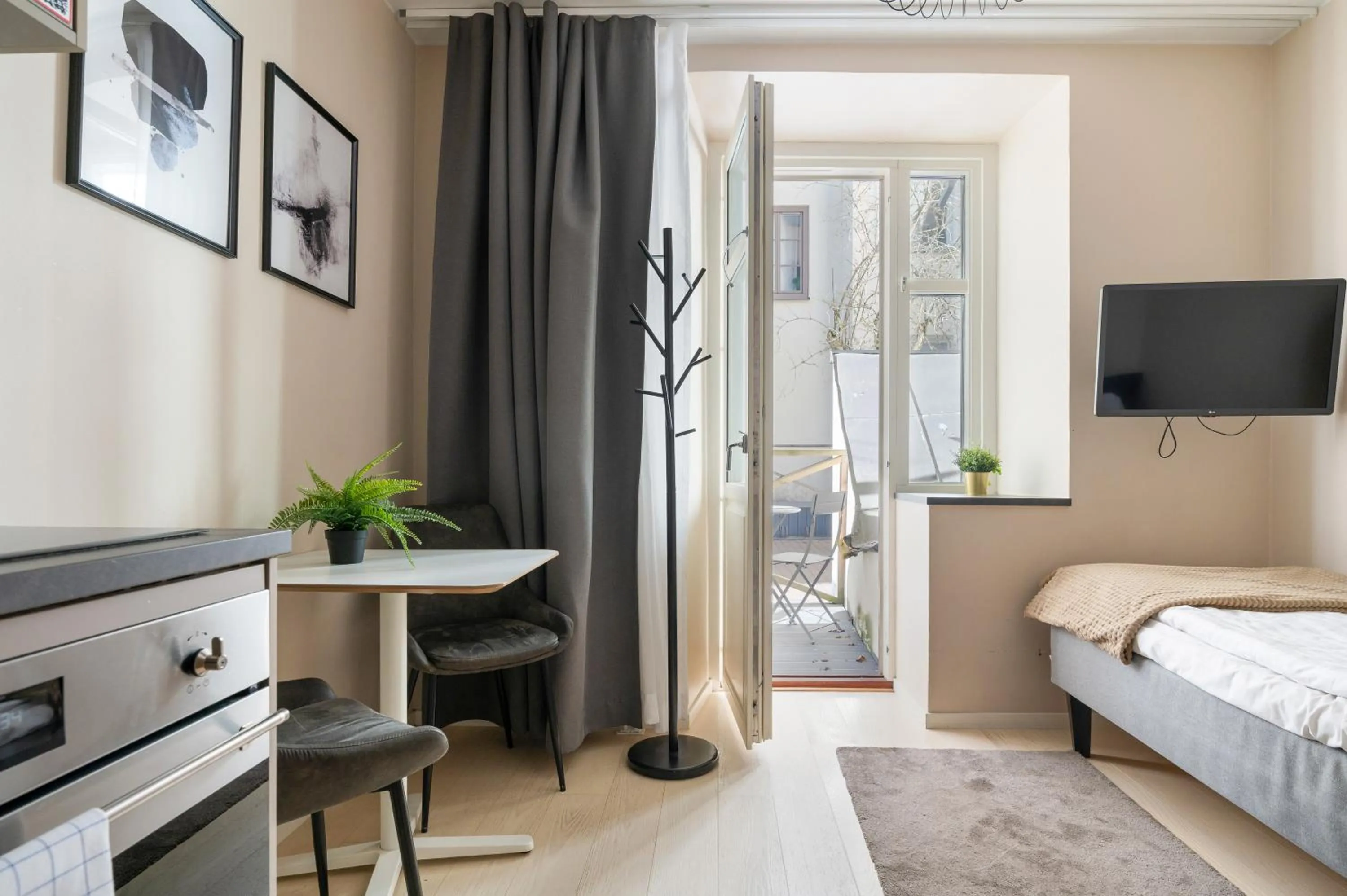 Patio, Bed in Forenom Apartments Stockholm Johannesgatan