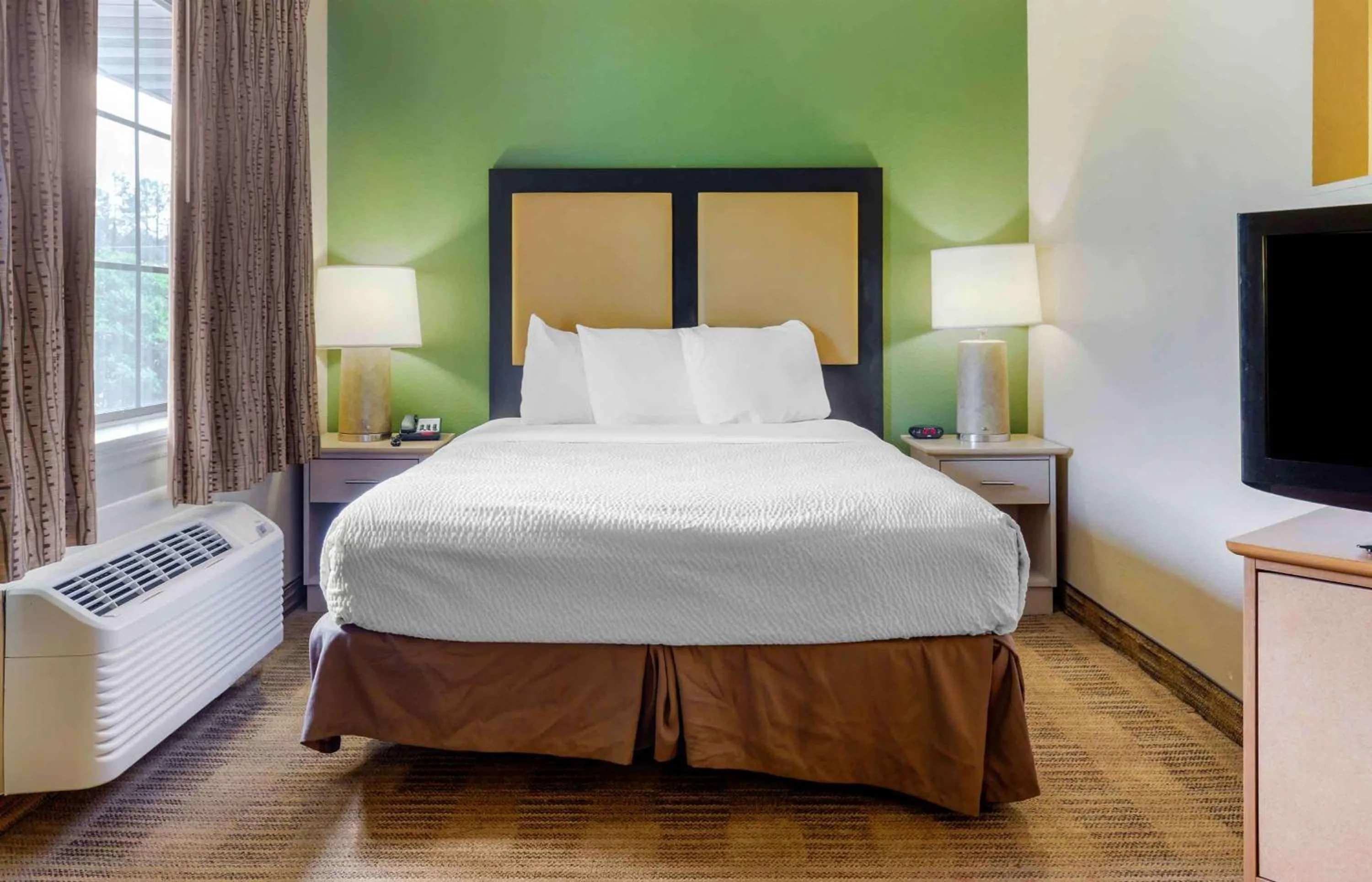 Bedroom, Bed in Extended Stay America Select Suites - Raleigh - RTP - 4610 Miami Blvd