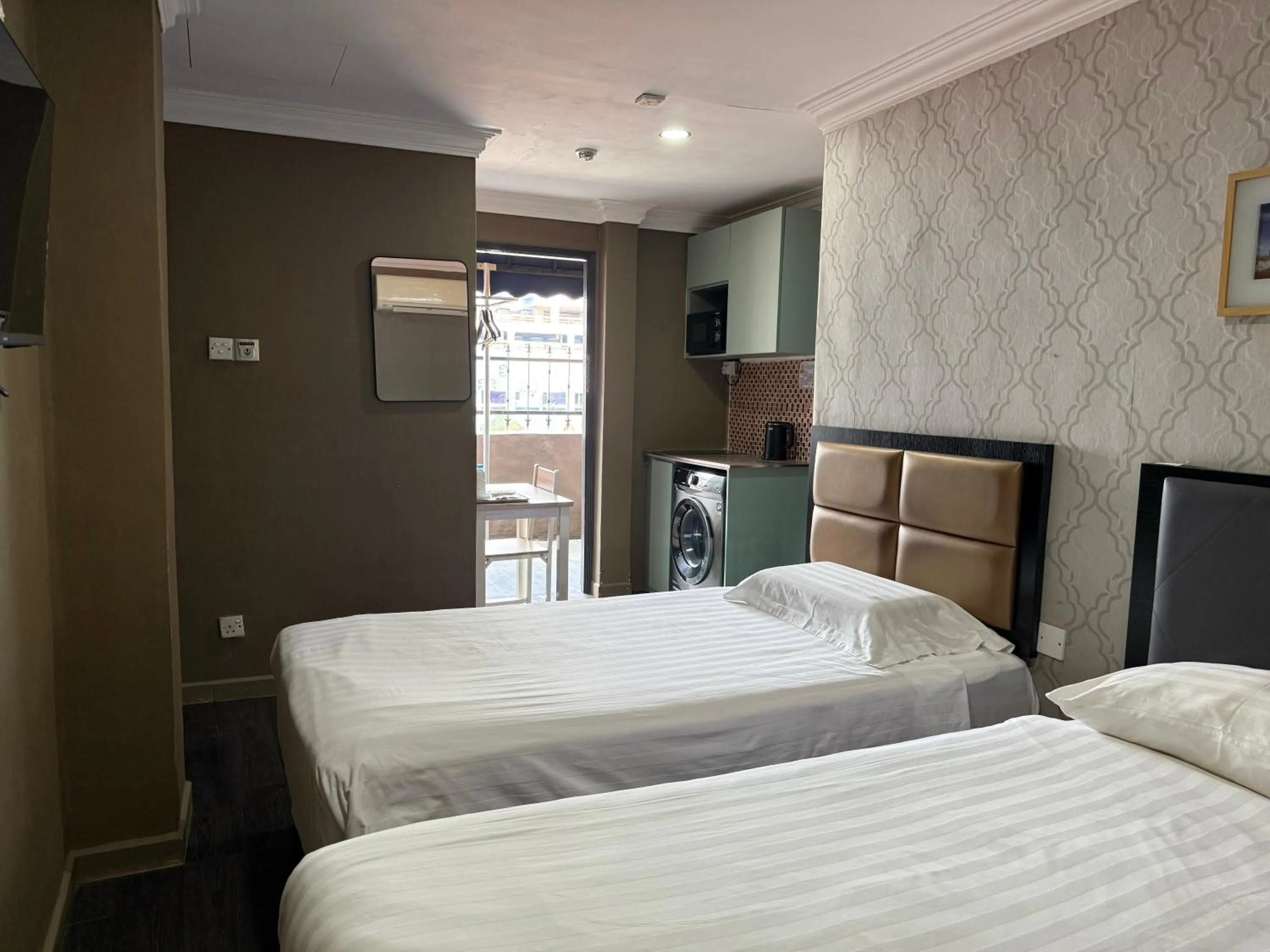 Bed in HOTEL JJH Aliwal