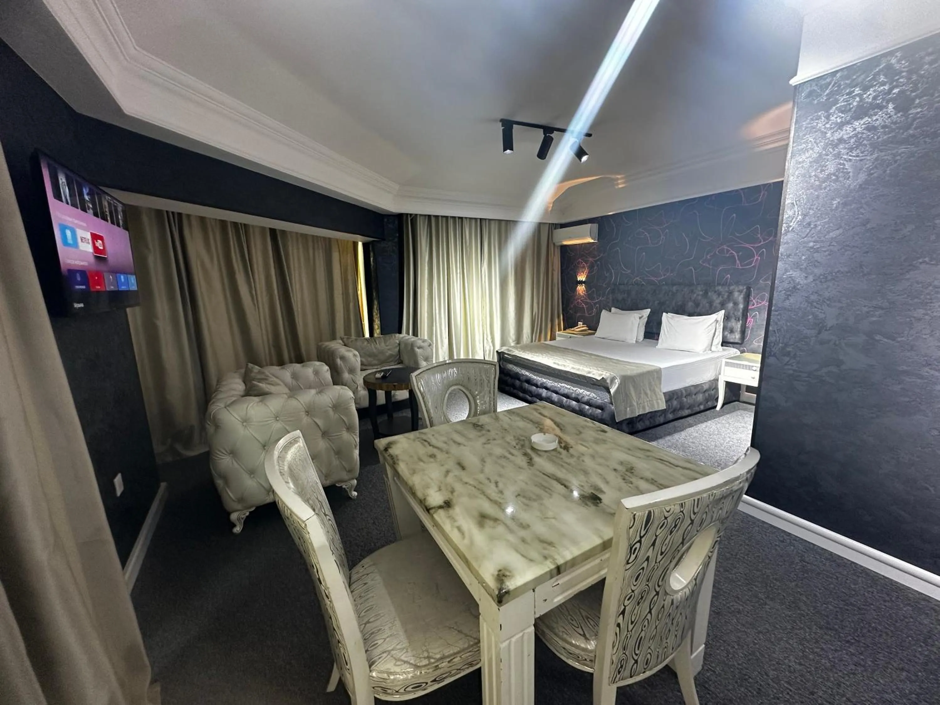 Photo of the whole room in Amber Hotel