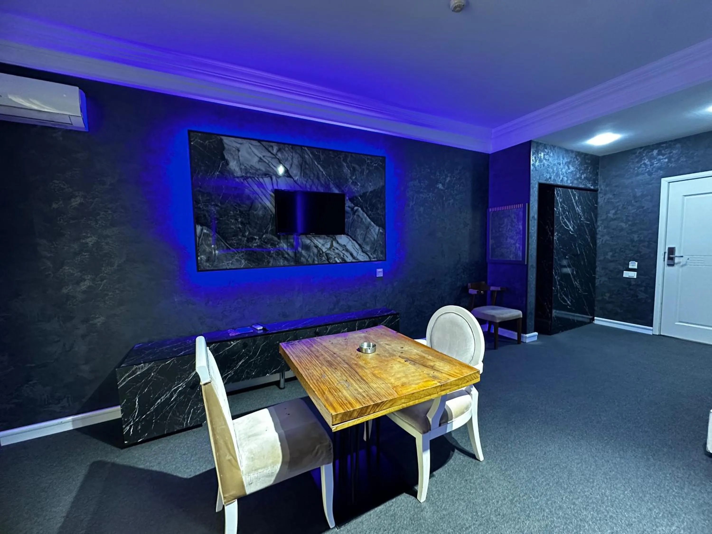 Living room in Amber Hotel