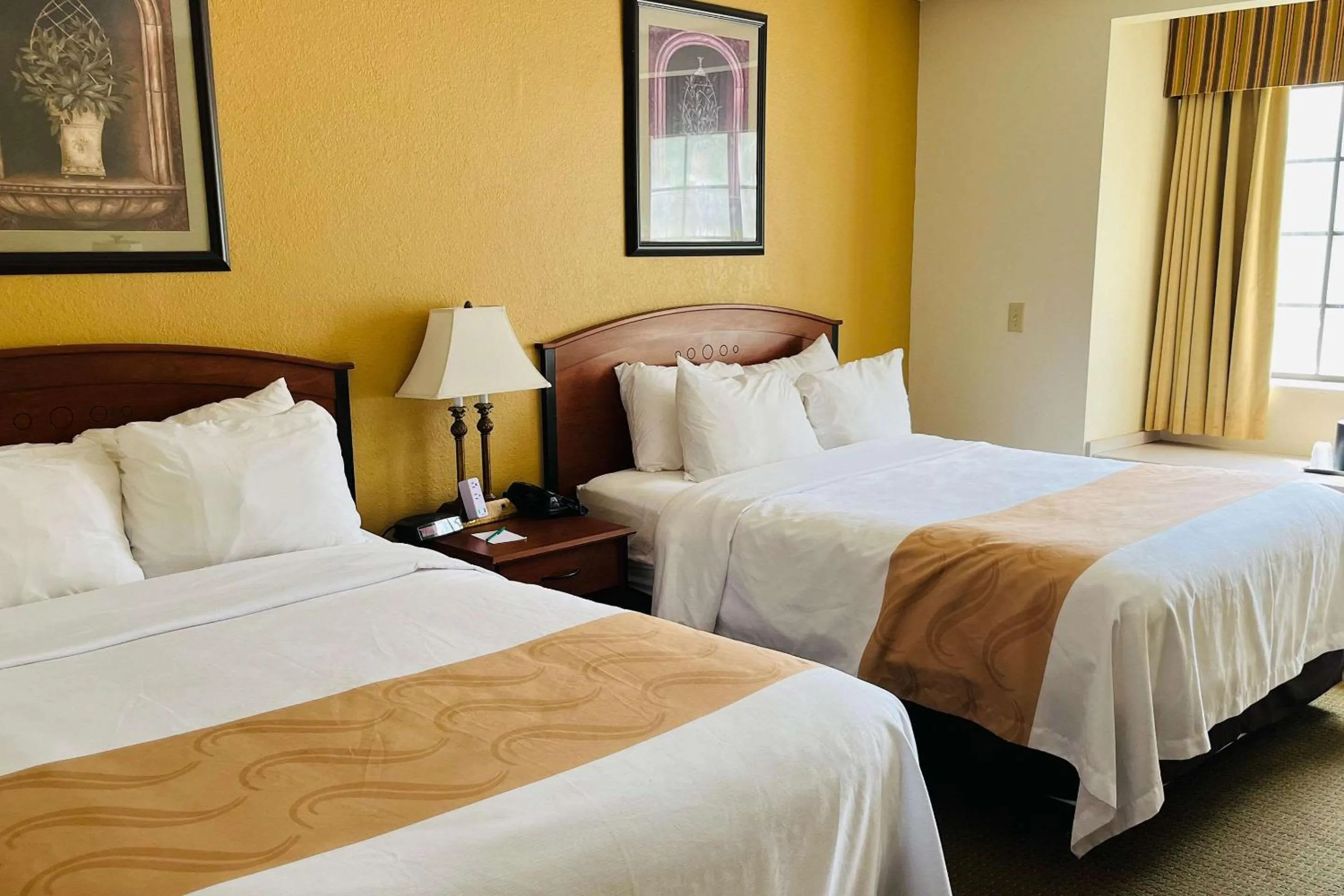 Bedroom, Bed in Quality Inn & Suites Prestonsburg next to Mountain Arts Center