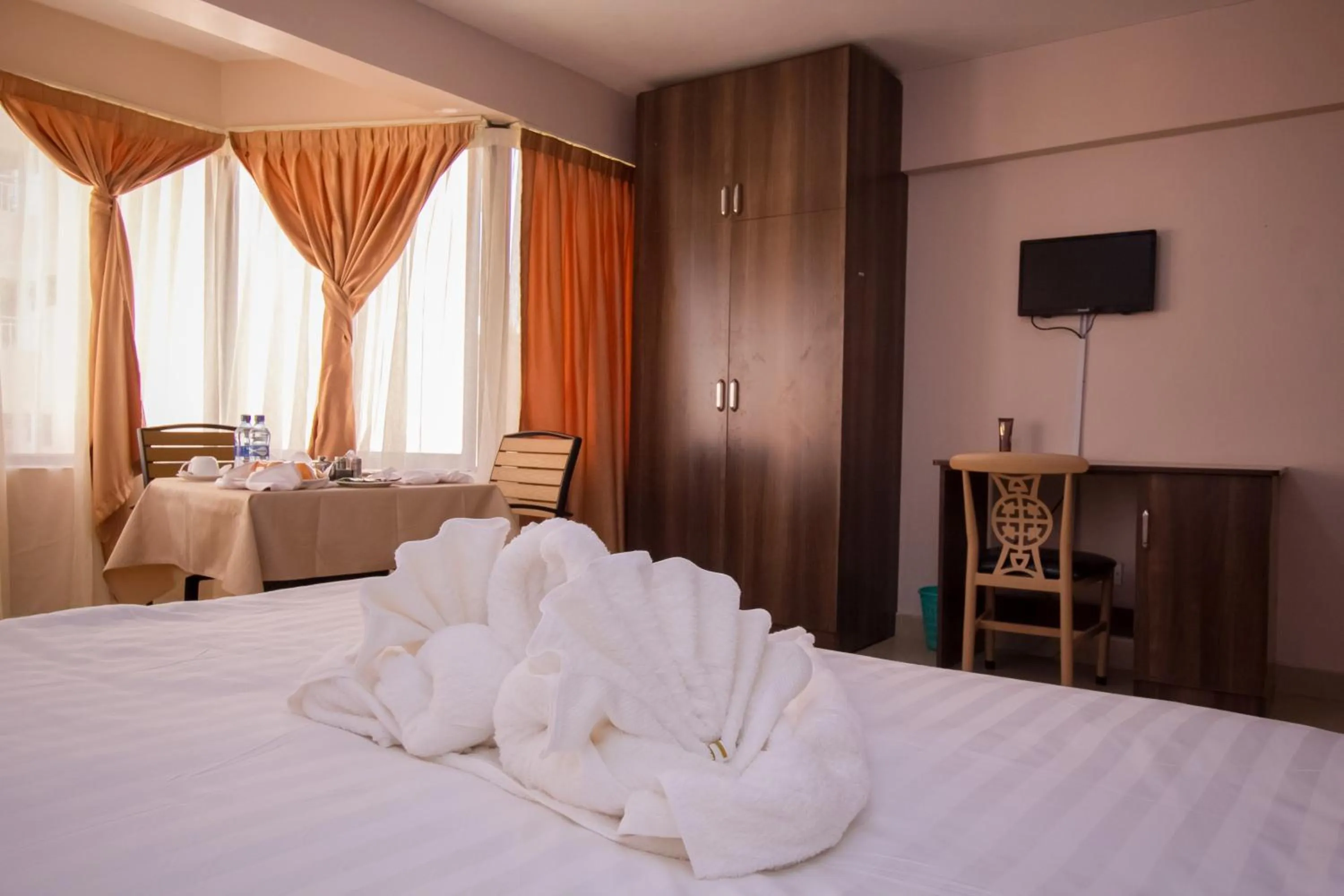 Photo of the whole room, TV/Entertainment Center in Paleo Hotel and Spa