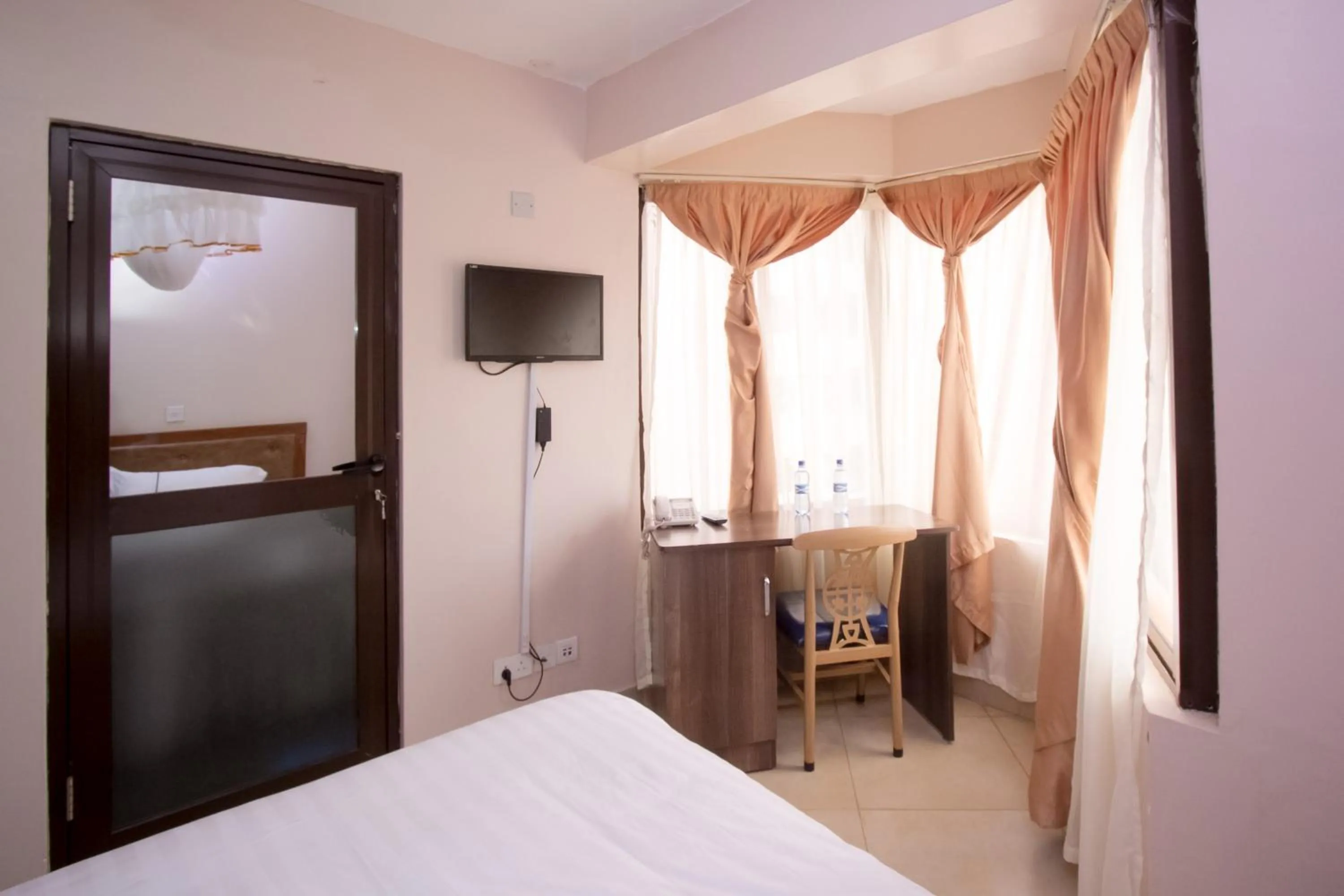 Photo of the whole room, TV/Entertainment Center in Paleo Hotel and Spa