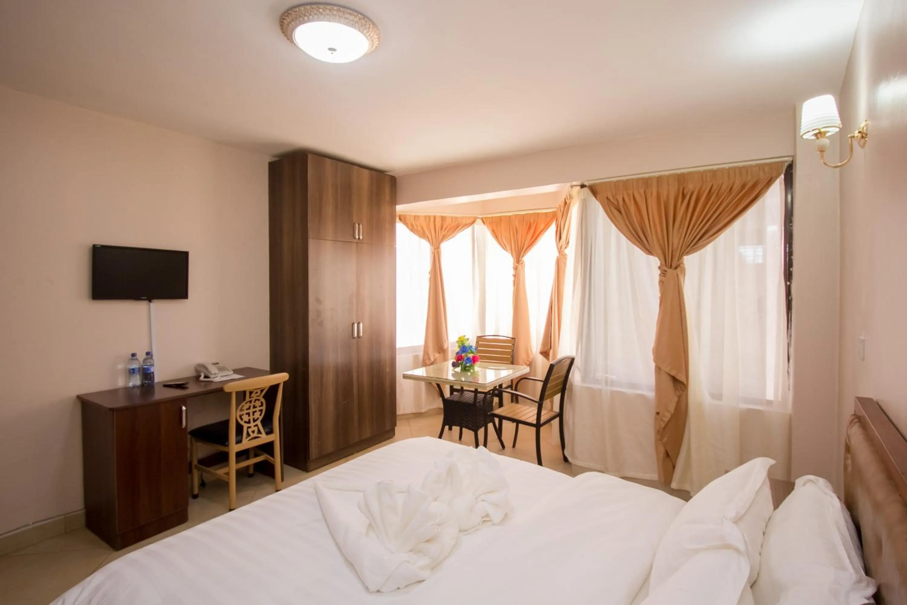 Photo of the whole room, TV/Entertainment Center in Paleo Hotel and Spa