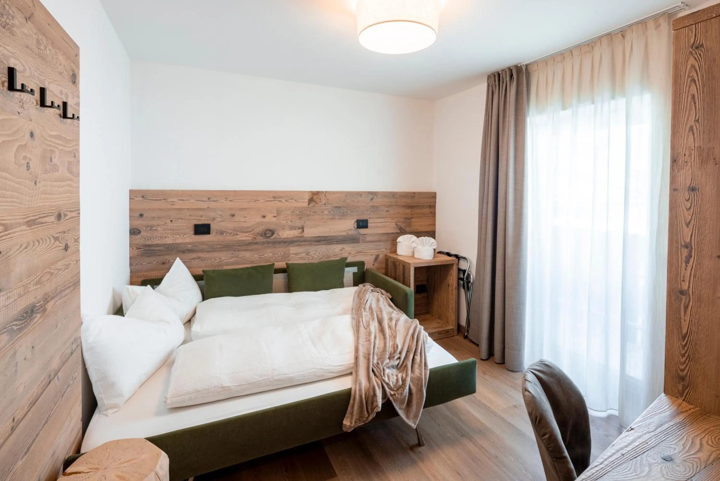 Bed in Albergo Vezzana