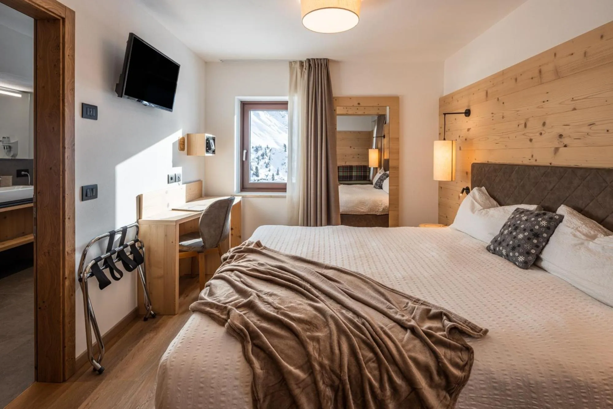 Bed in Albergo Vezzana