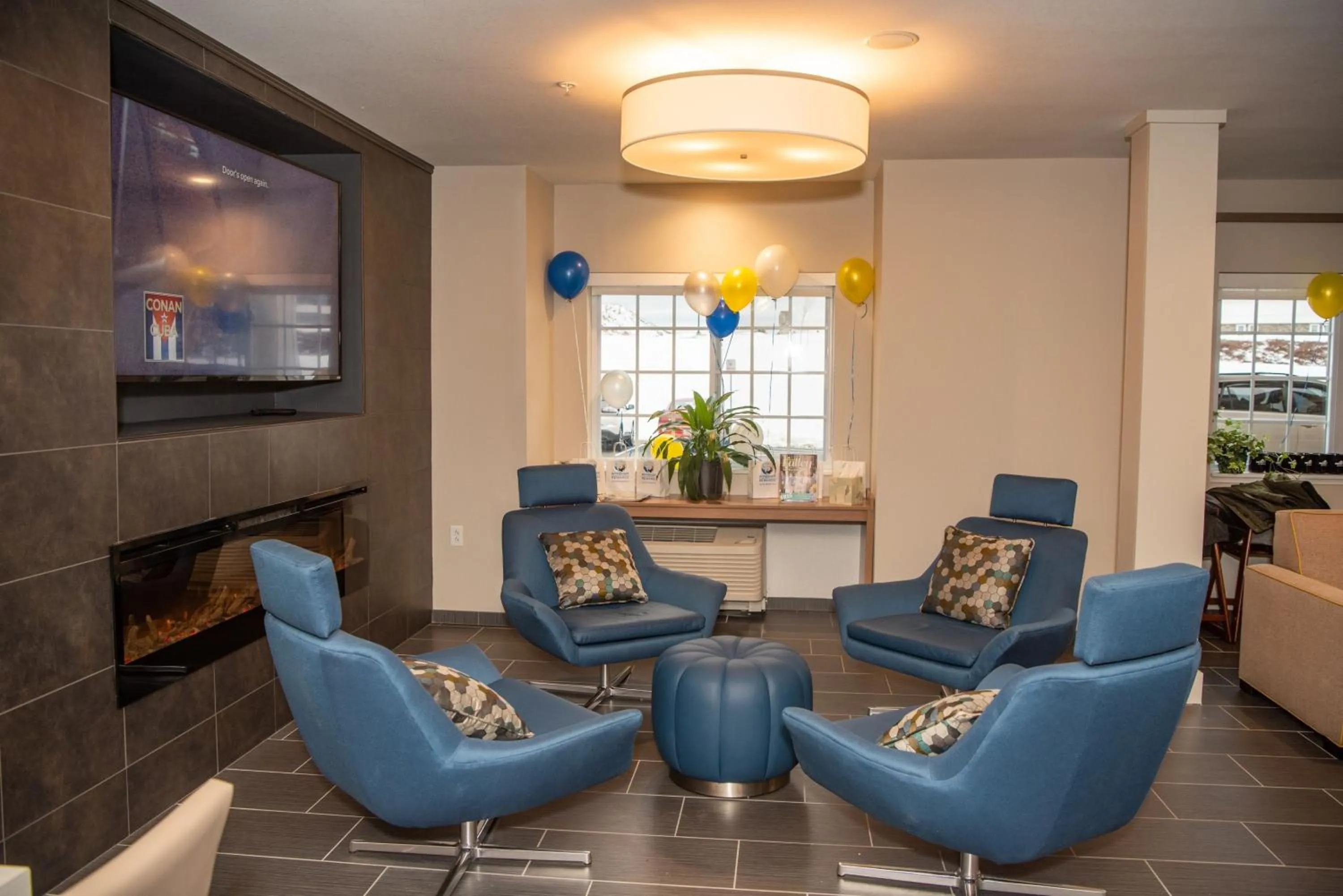 Communal lounge/ TV room in Microtel Inn & Suites by Wyndham Carlisle