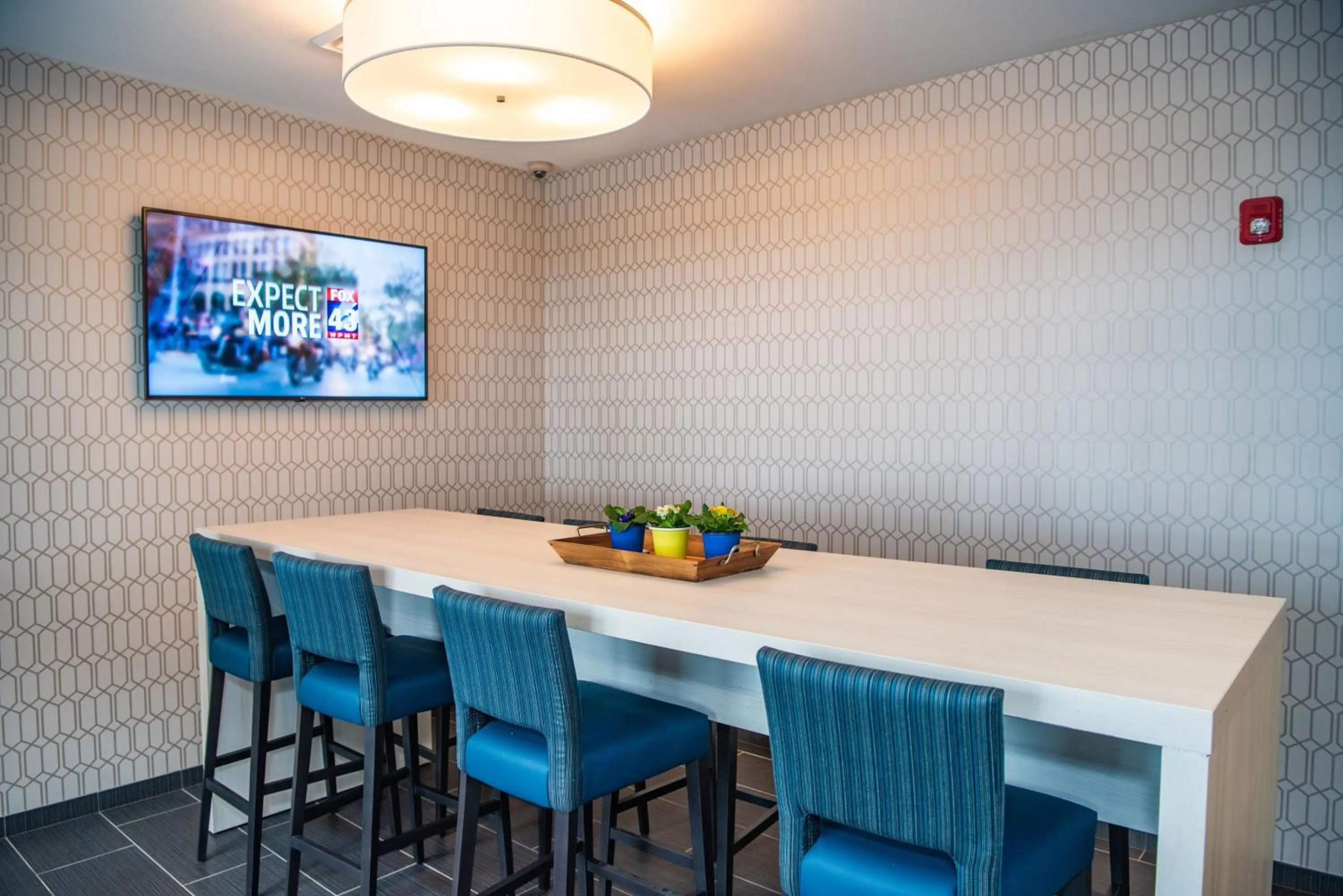 Communal lounge/ TV room in Microtel Inn & Suites by Wyndham Carlisle