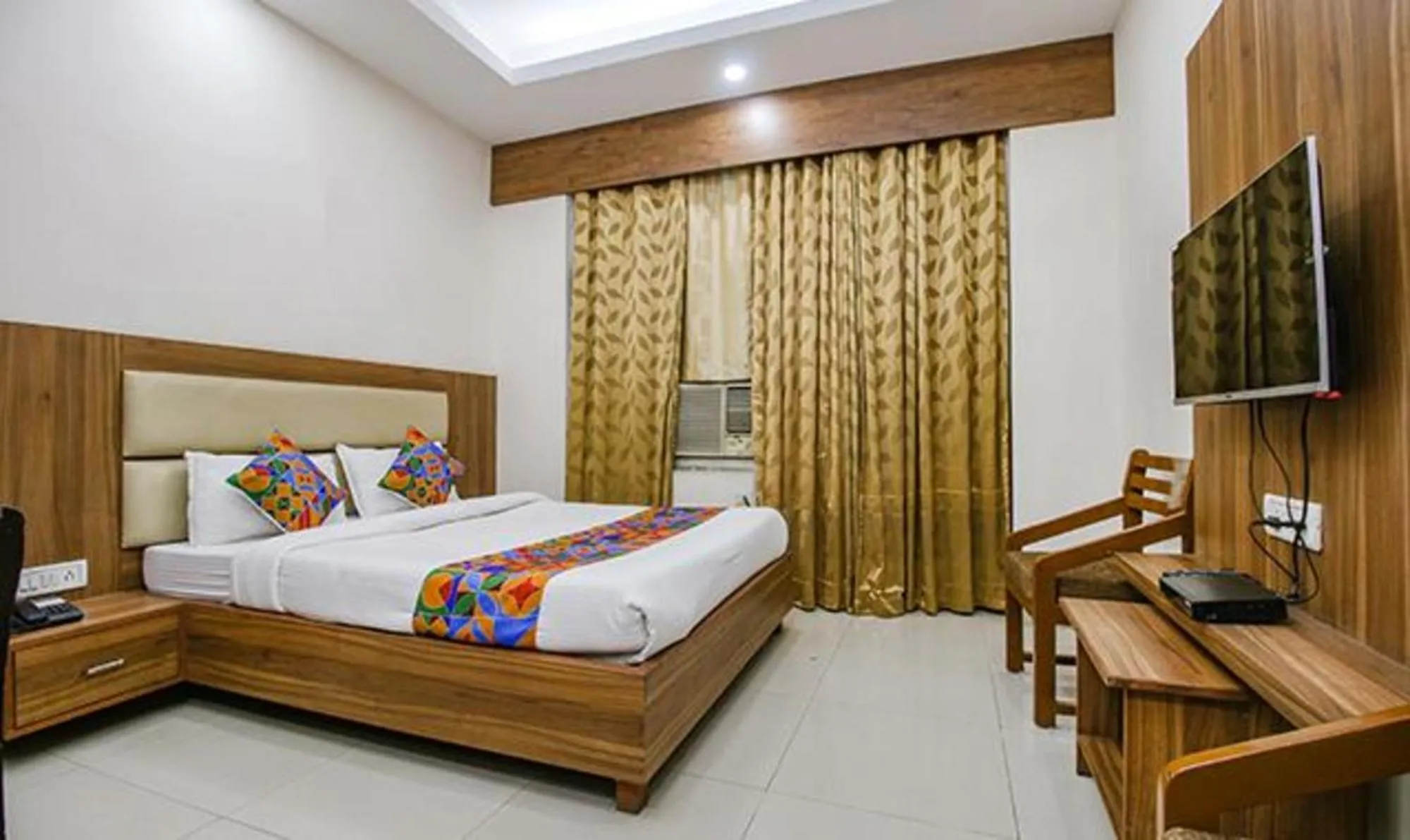 Bed in FabHotel Silver Inn I