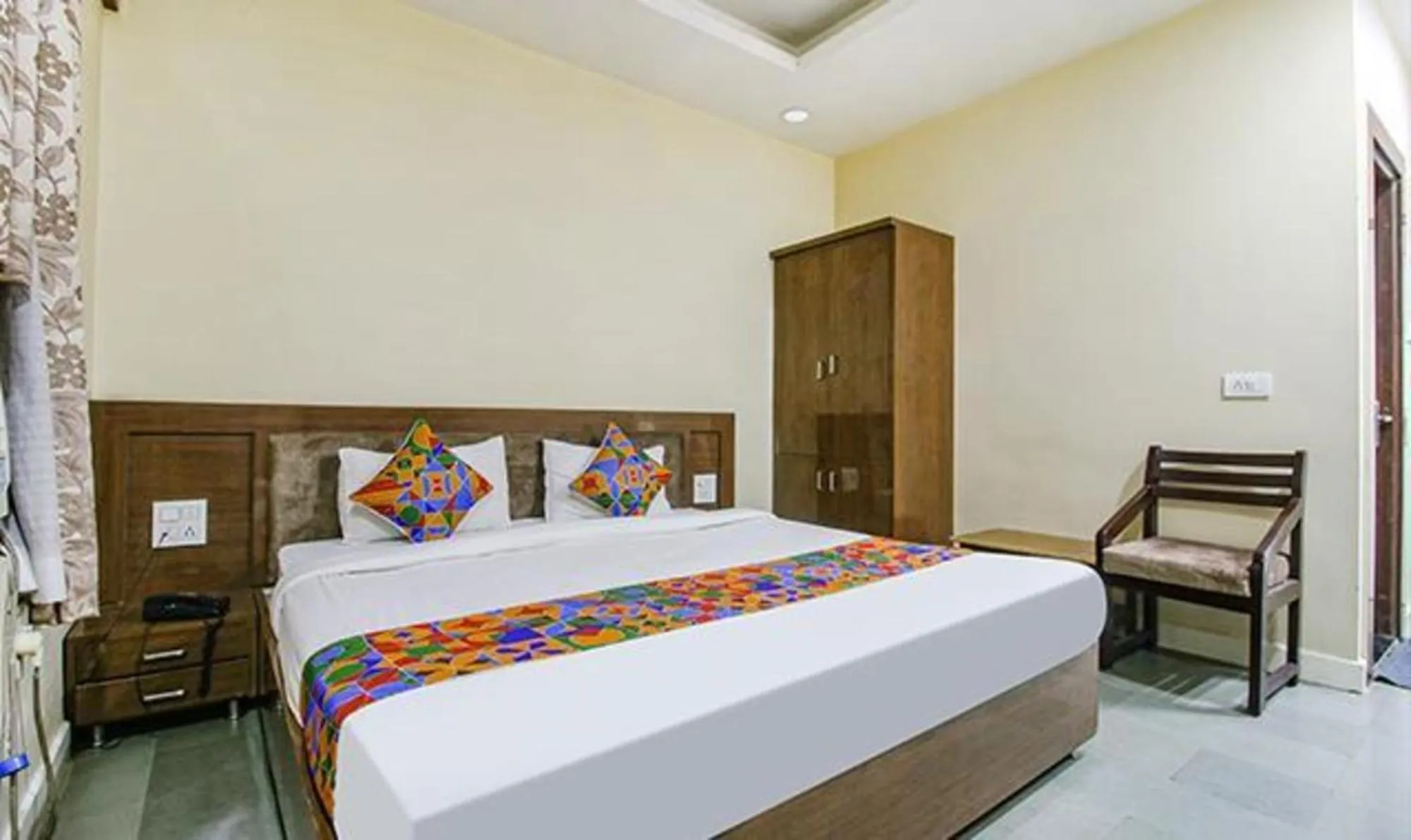 Bed in FabHotel Silver Inn I