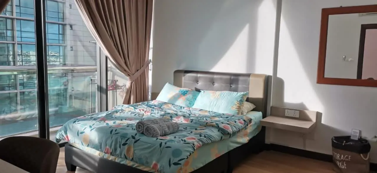 Bed in Imperial Suites Apartments