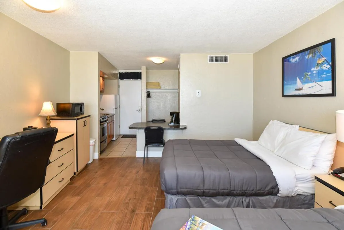 Bed in Cove Motel Oceanfront