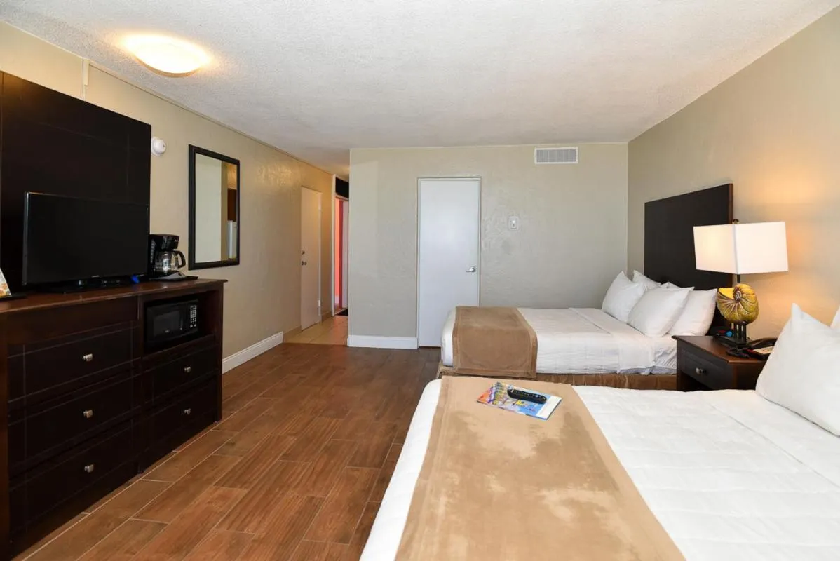 Bed in Cove Motel Oceanfront