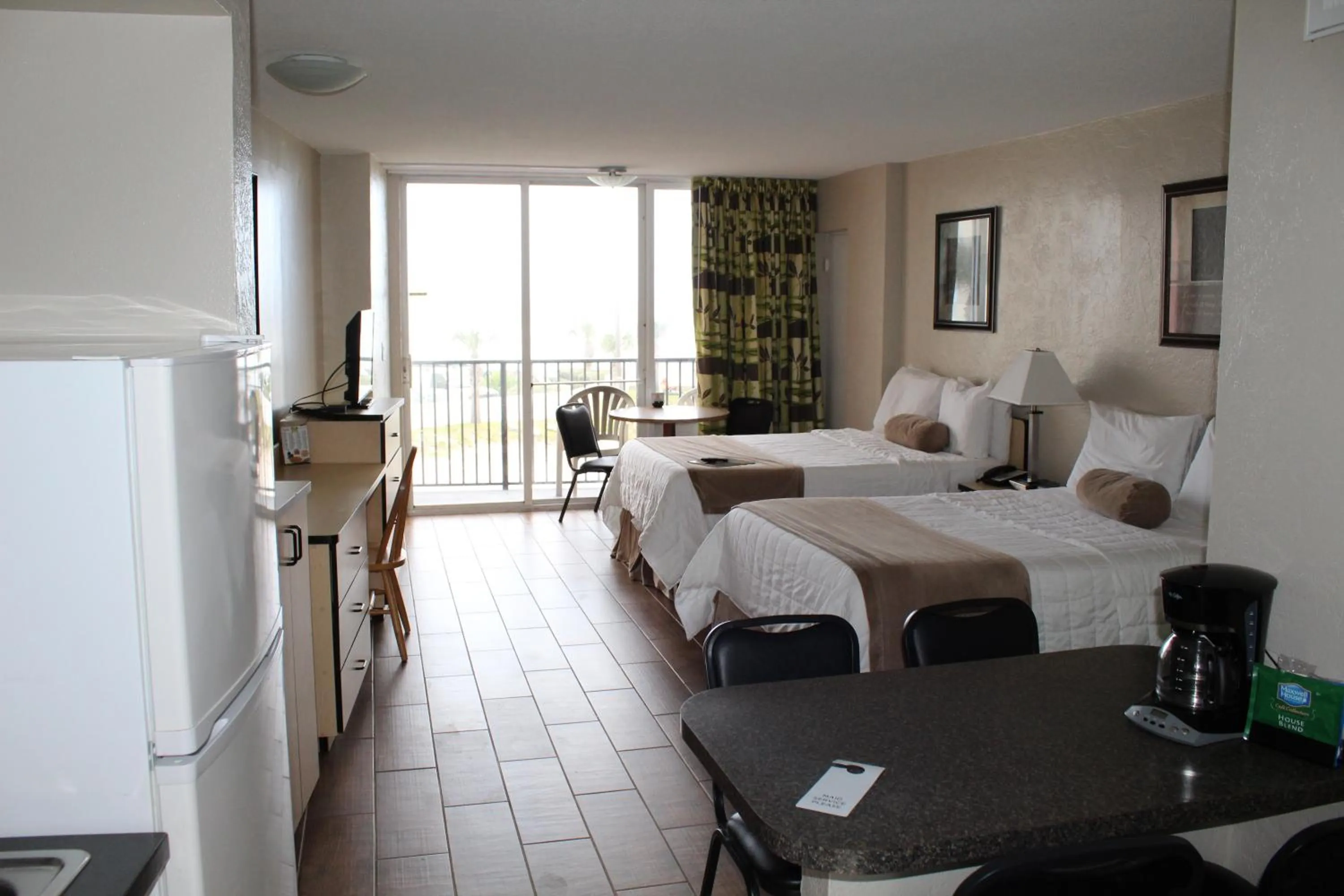 Bed in Cove Motel Oceanfront