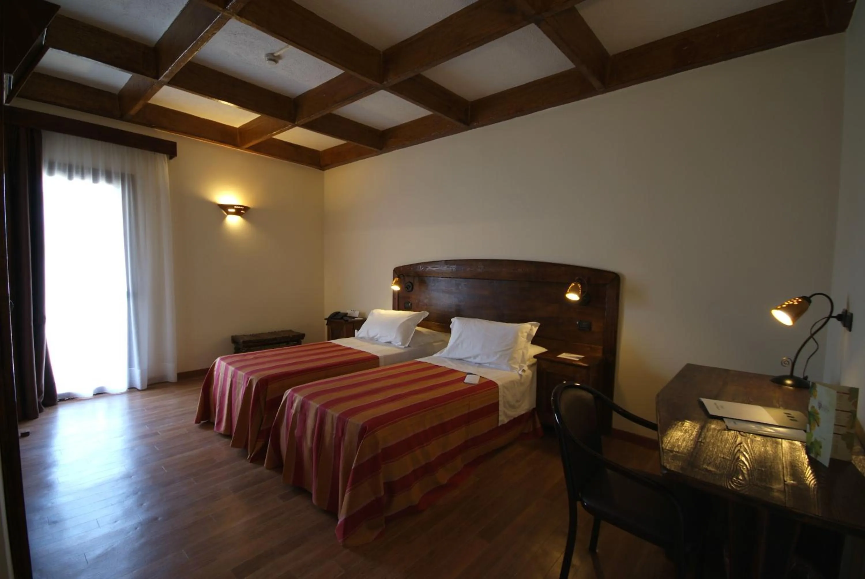 Photo of the whole room, Bed in UNA HOTELS Regina Bari