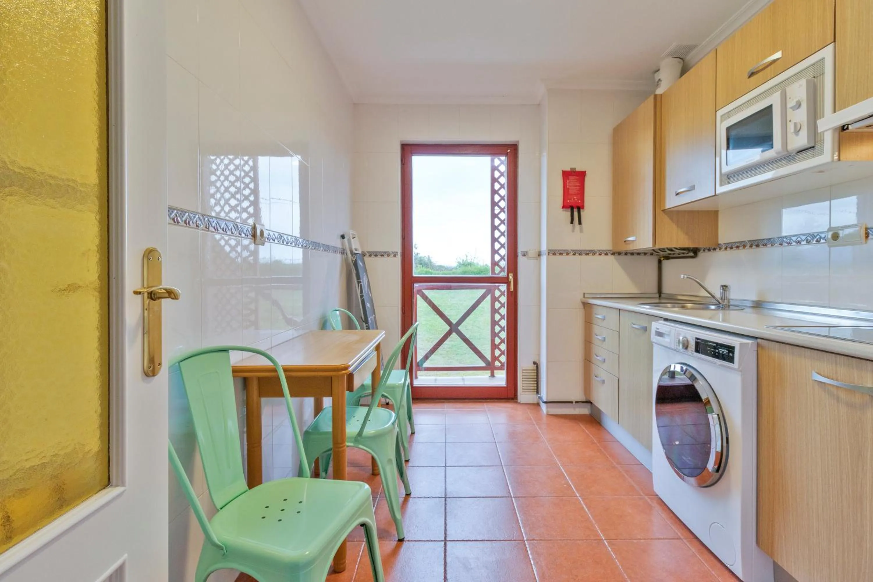 Kitchen or kitchenette in Abba Comillas Apartments