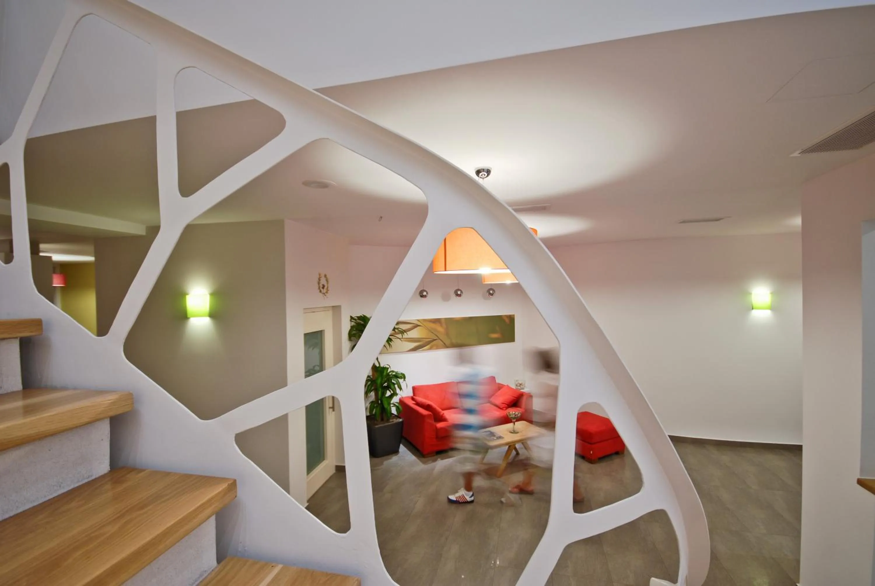 Communal lounge/ TV room, Bed in Xenia Hotel