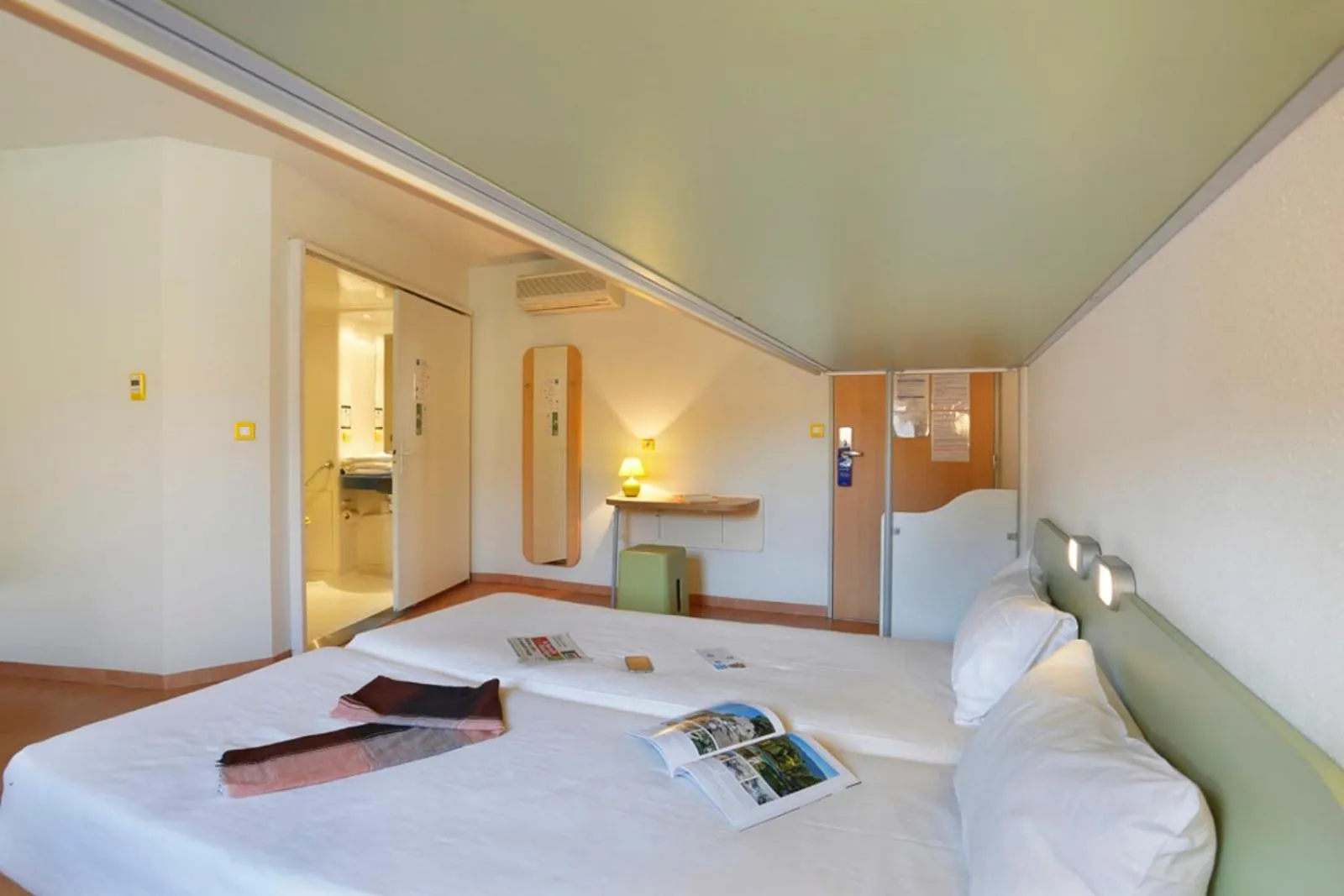 Bed in First Inn Hotel