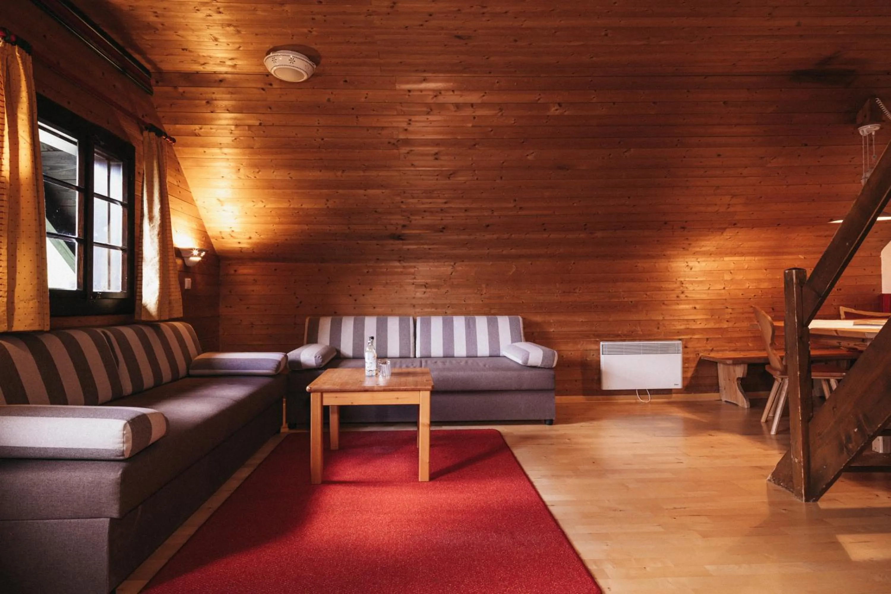 Living room, Bed in Naturel Hoteldorf Seeleitn