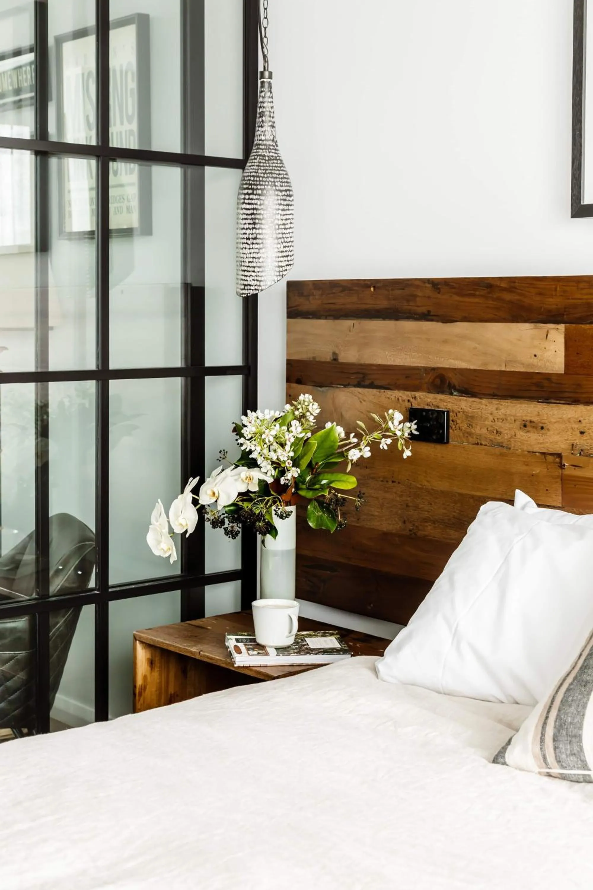 Bed in Timber Door Luxury Accommodation Geelong