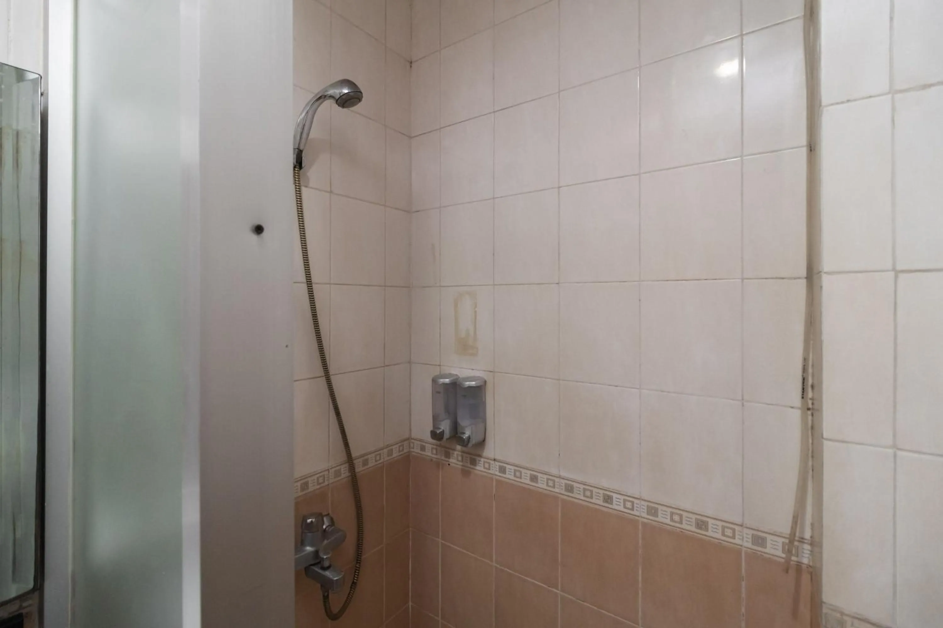 Bathroom in RedDoorz at Jalan Gunung Sahari