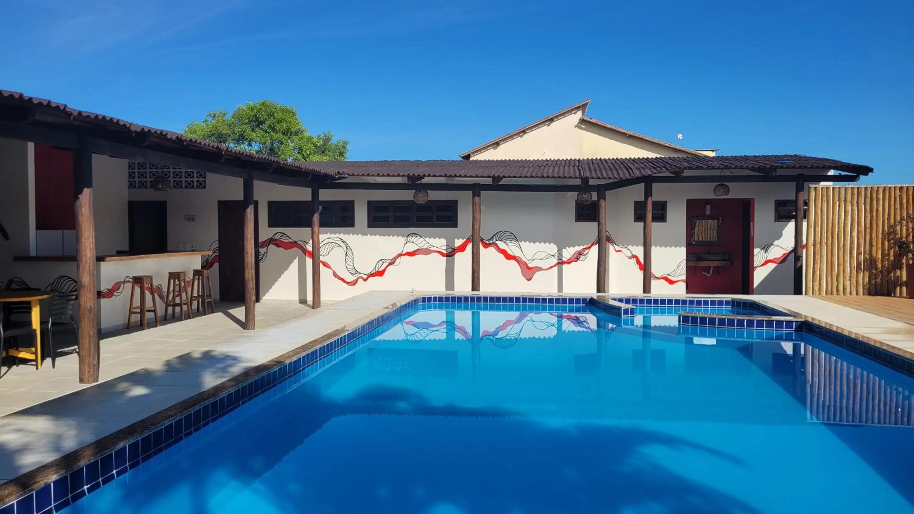 Swimming pool in Pousada Coral de Fogo