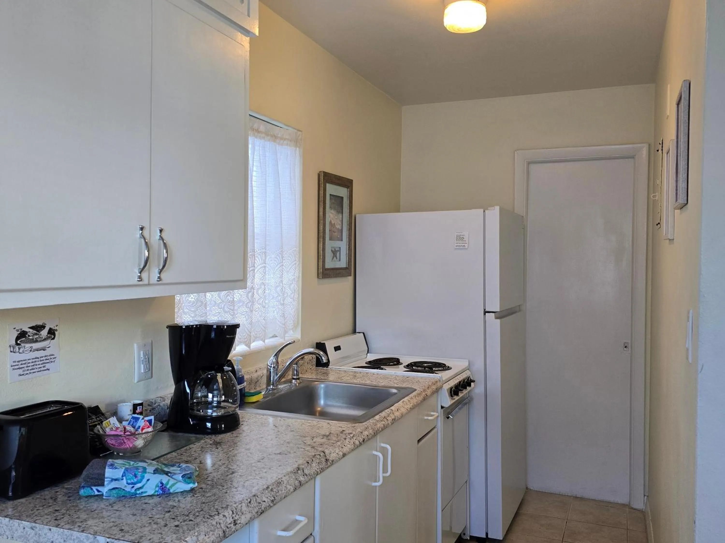 Kitchen or kitchenette in Oceanfront Sea Scape Motel
