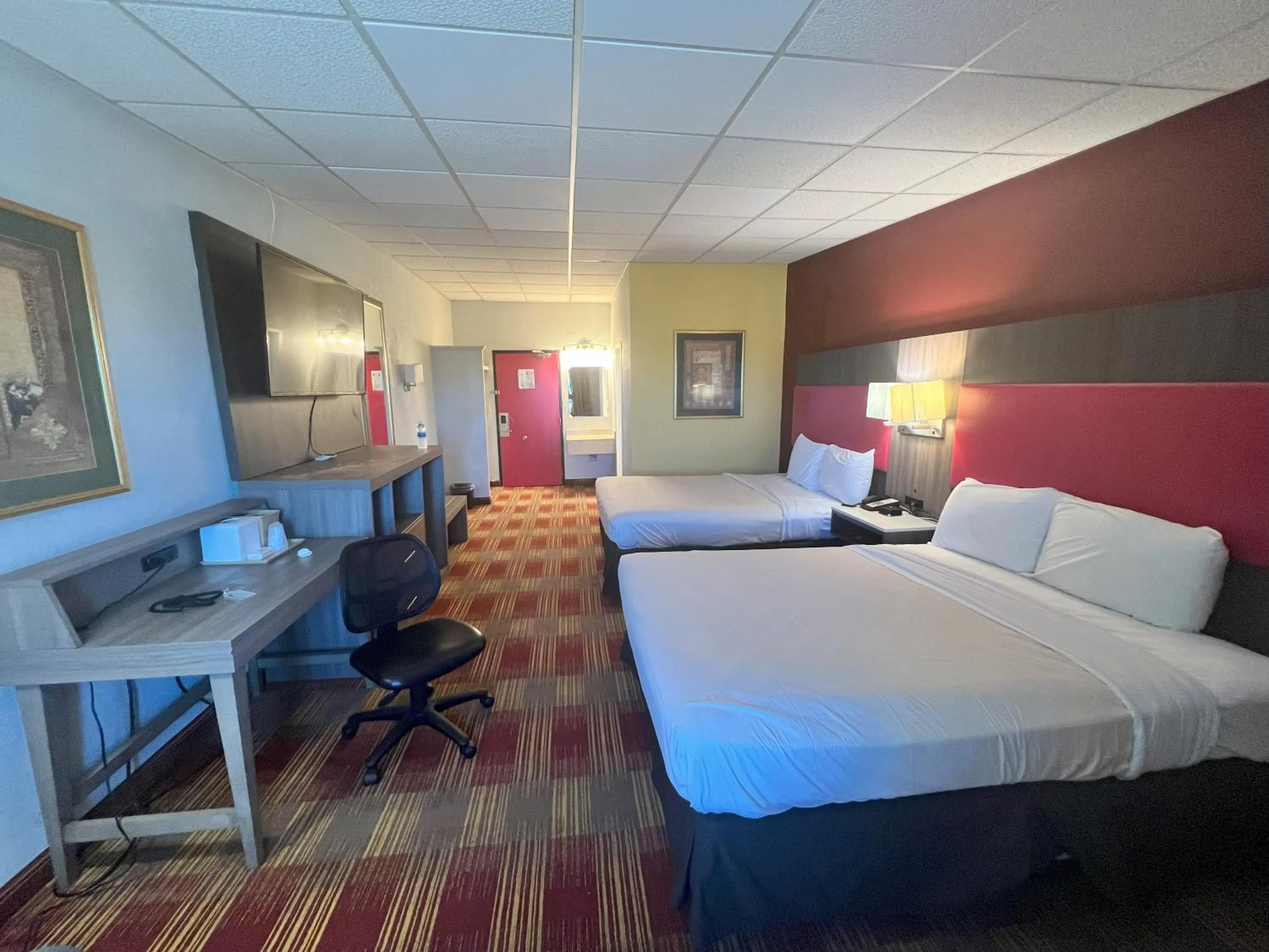 Bed in Countryside Suites Kansas City Independence I-70 East Sports Complex Hotel