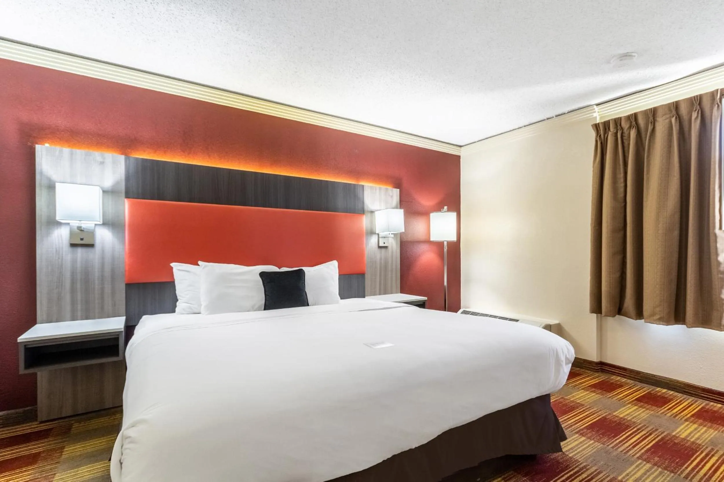 Bed in Countryside Suites Kansas City Independence I-70 East Sports Complex Hotel