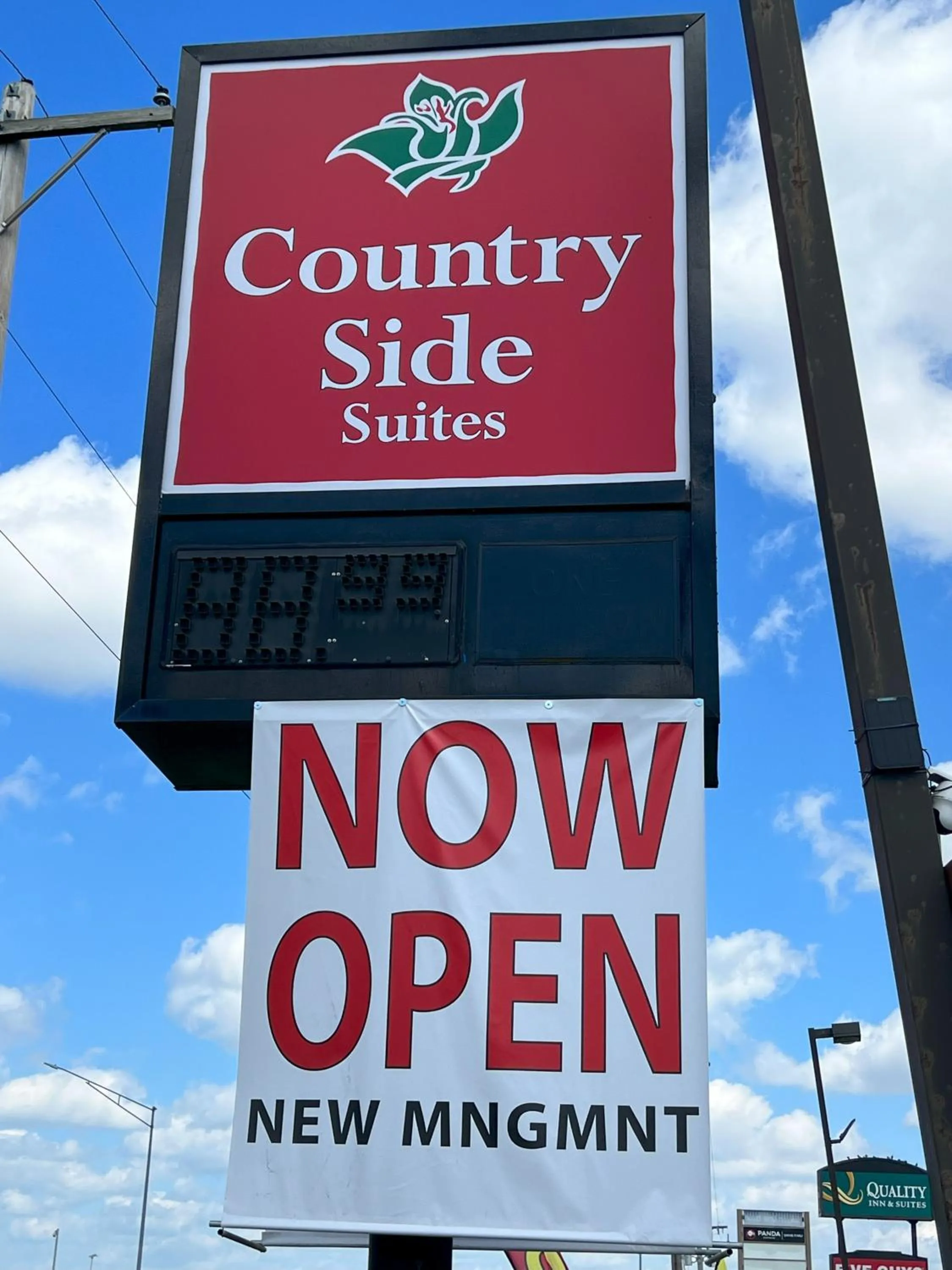 Property logo or sign in Countryside Suites Kansas City Independence I-70 East Sports Complex Hotel